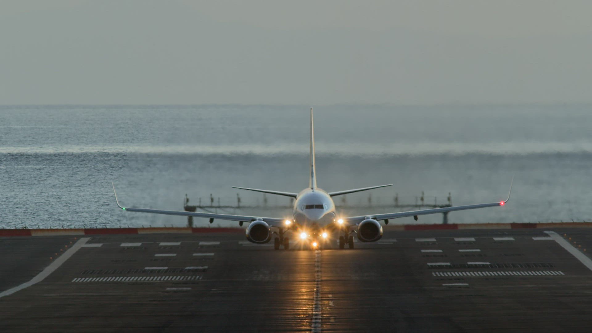 Commercial jet airplane taking off runway