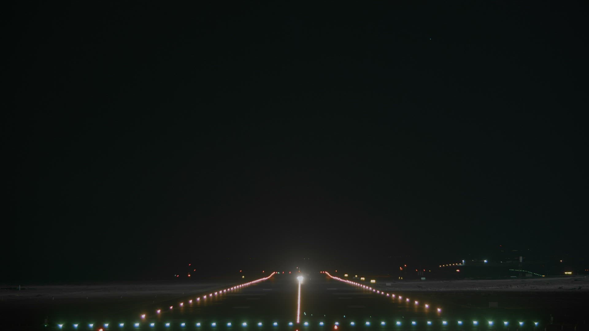 Airplane in the night sky
