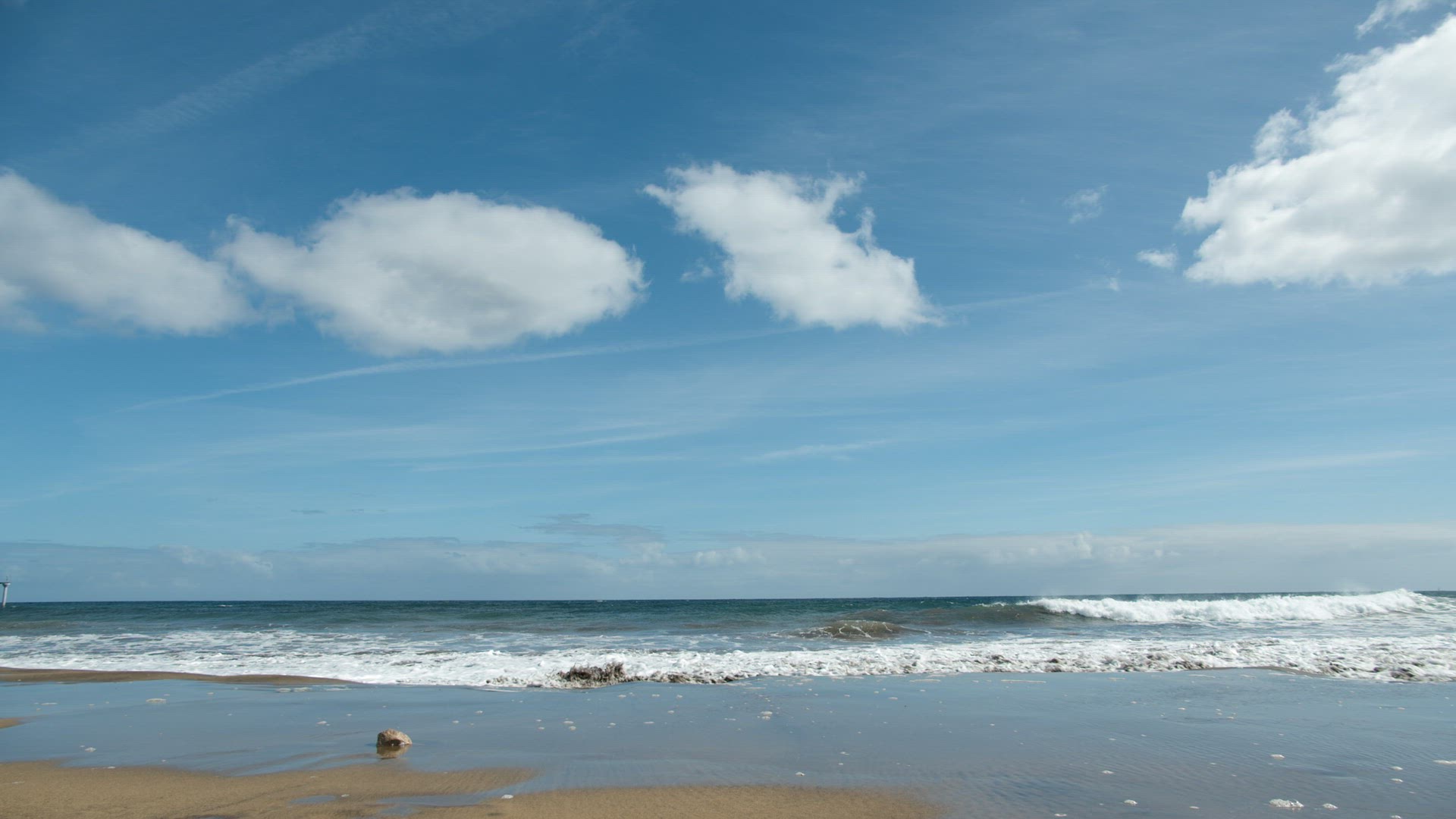 Commercial plane flying over sea