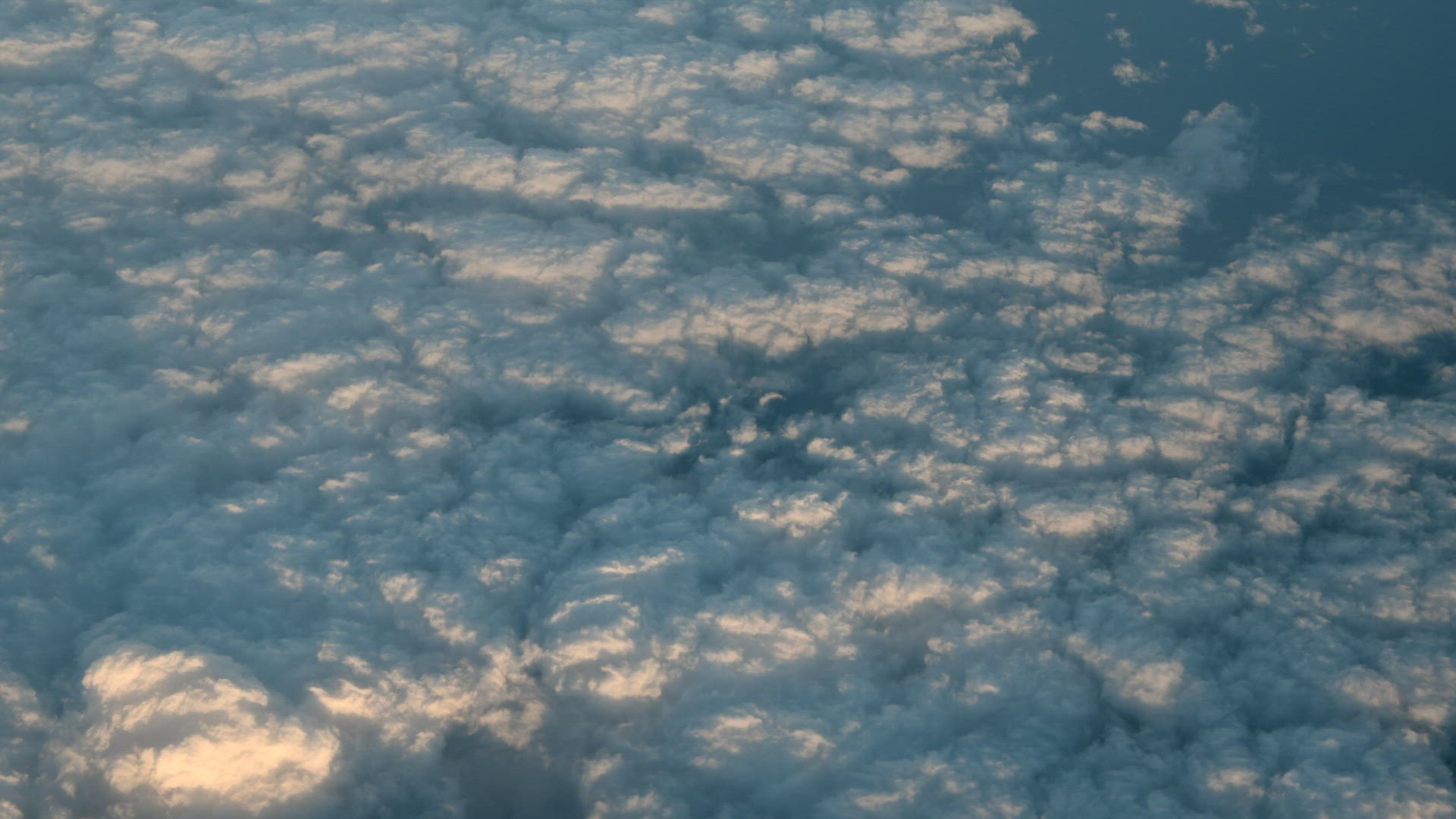 Airplane flight above the clouds