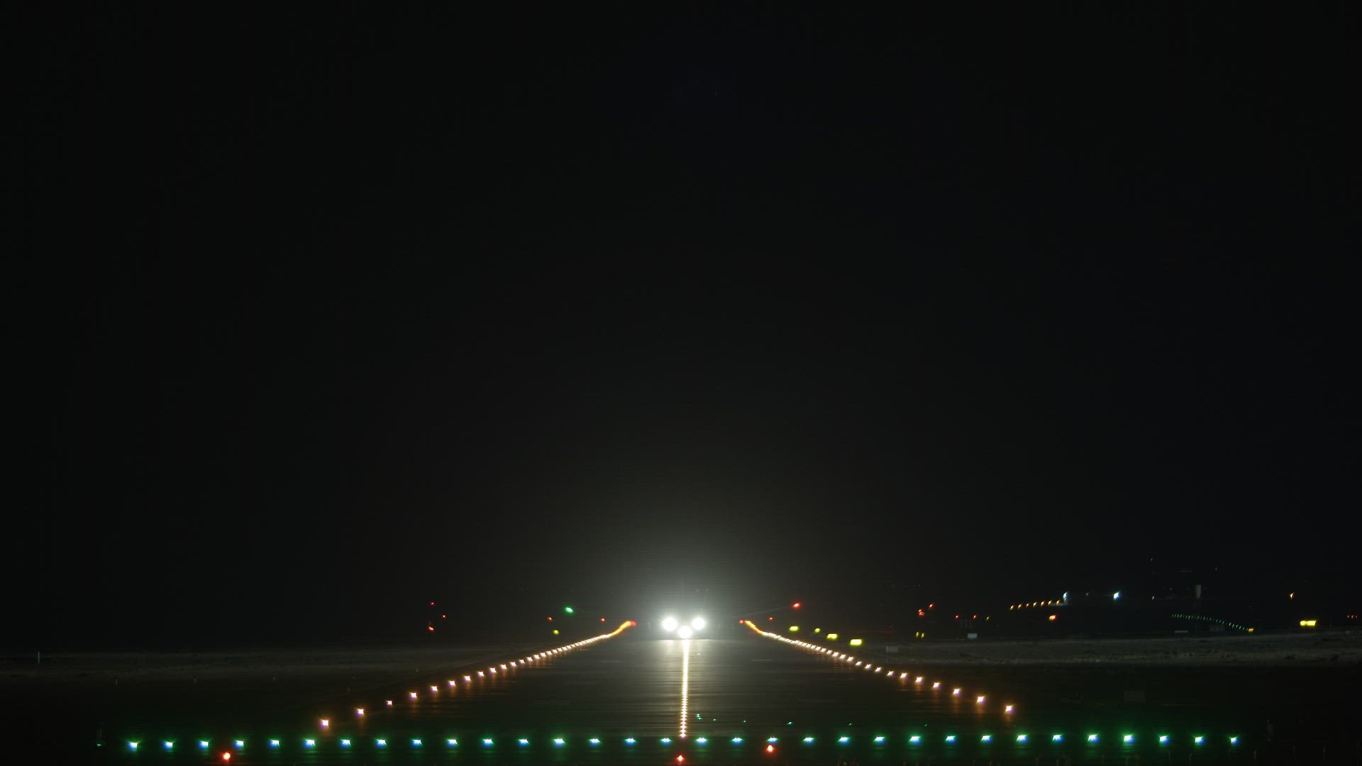 Airplane takeoff in the night sky