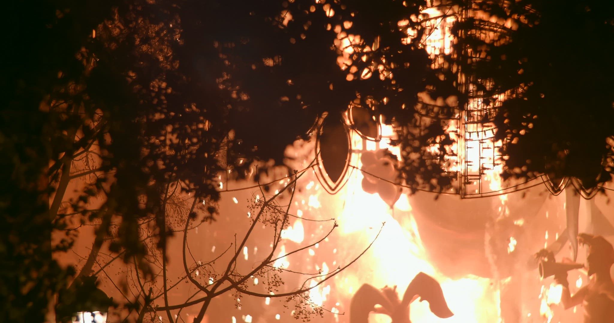 Bonfire performance with fireworks during Fallas celebration in Spain