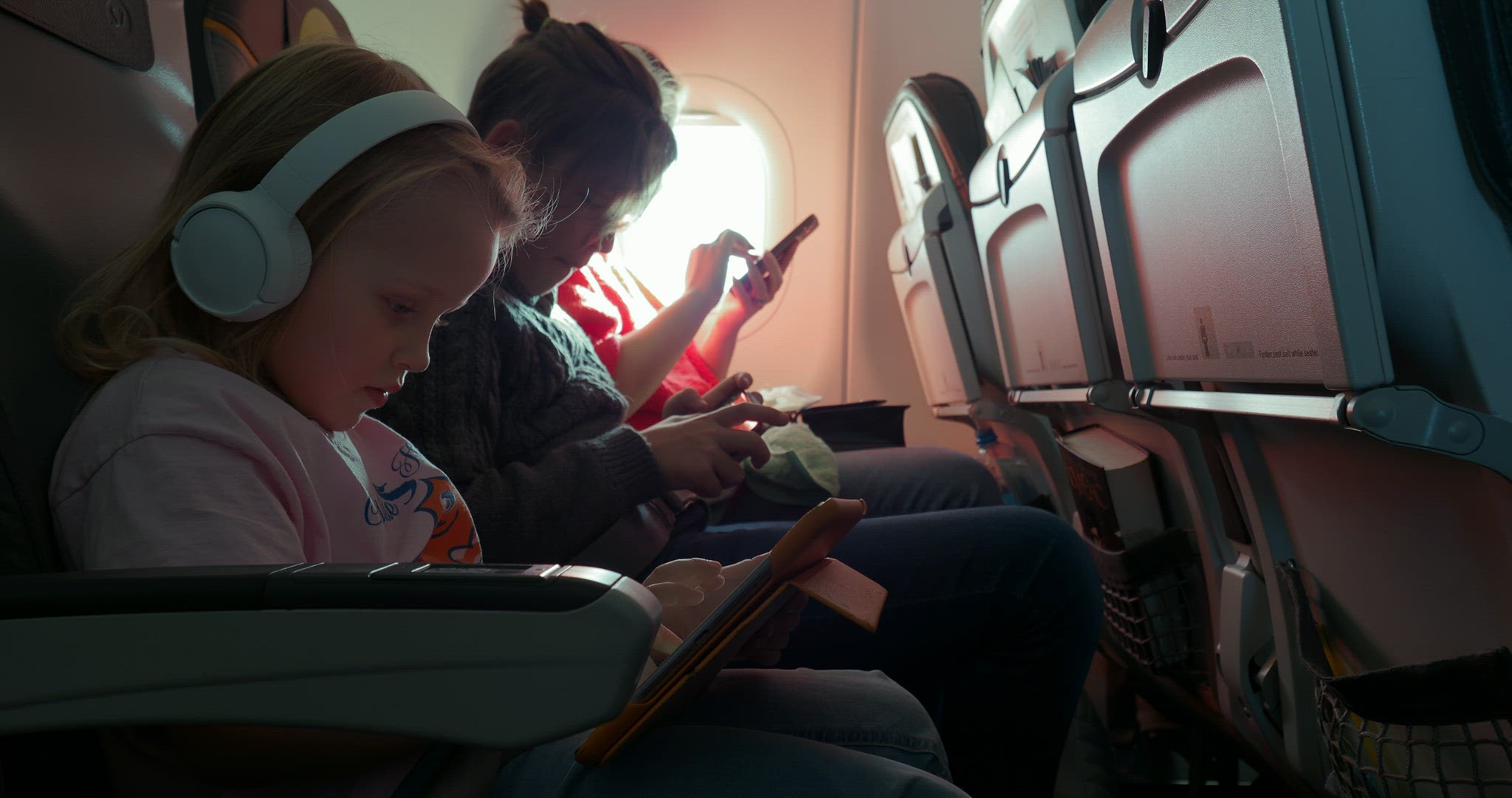 Family traveling in an airplane