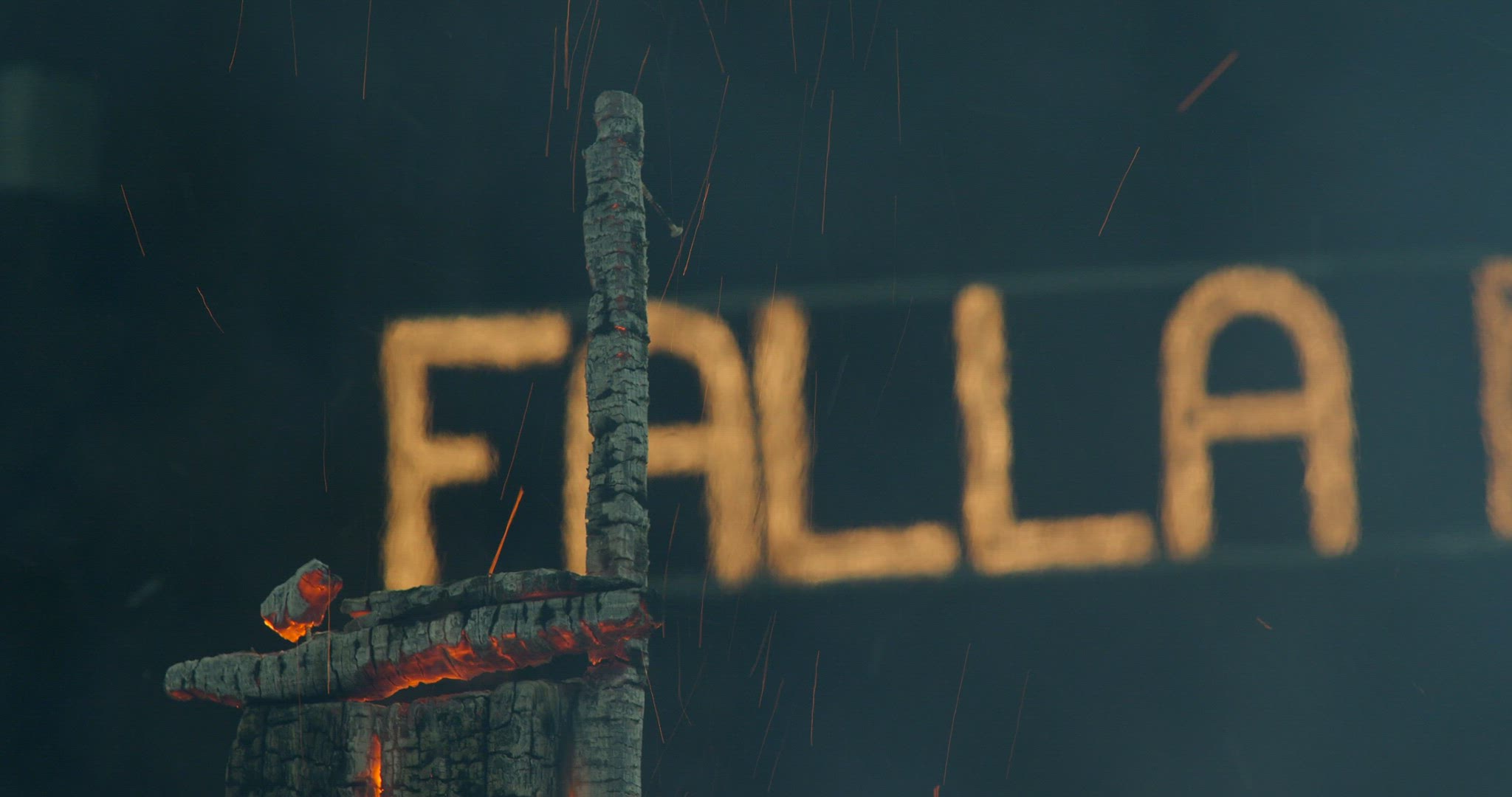Burning ruins of ninot at Fallas celebration in Spain