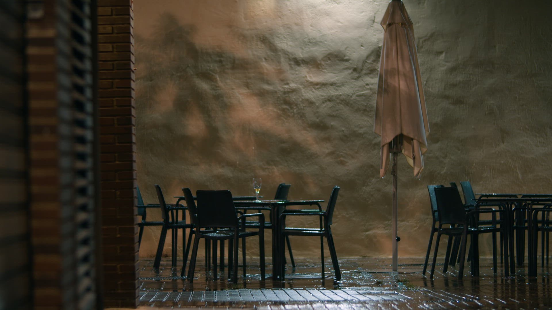 Empty street cafe in a rainy day