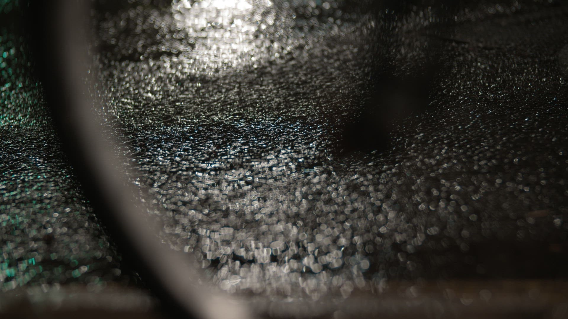 Bicycle wheel on wet pavement