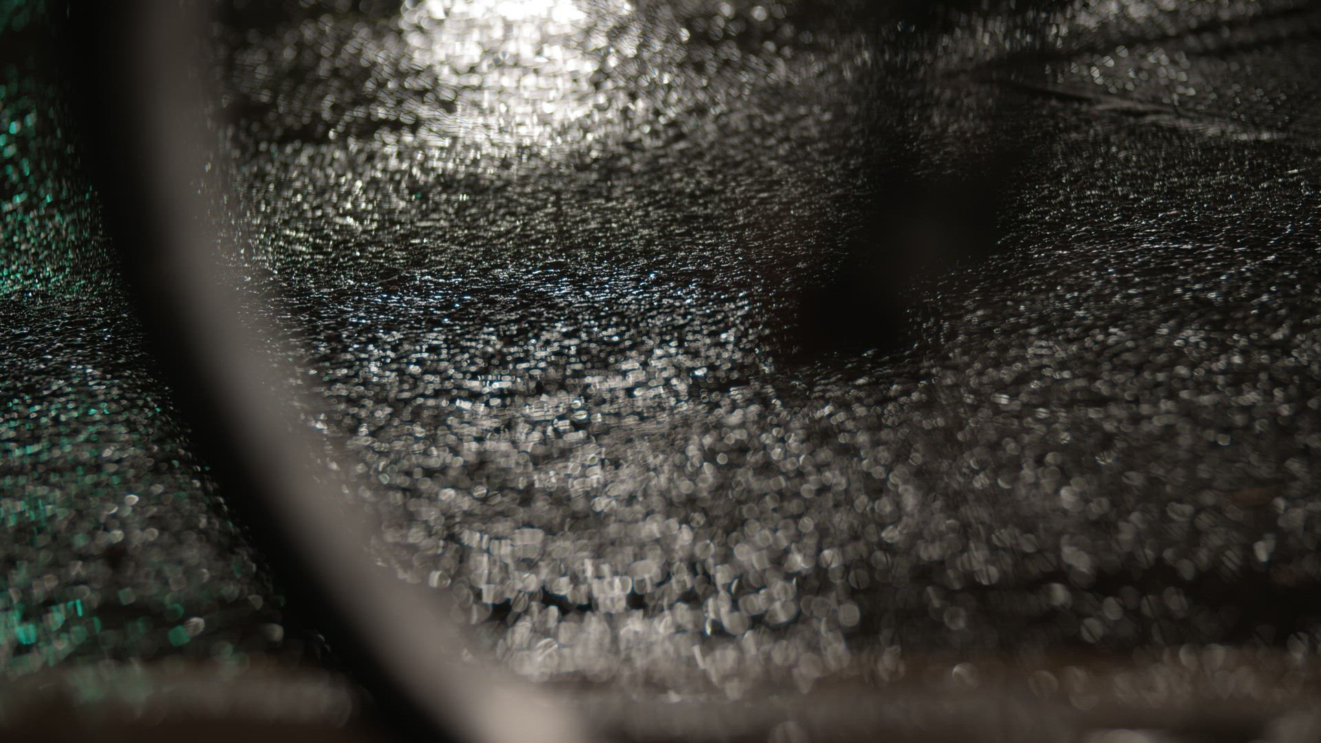 Bicycle wheel on wet pavement