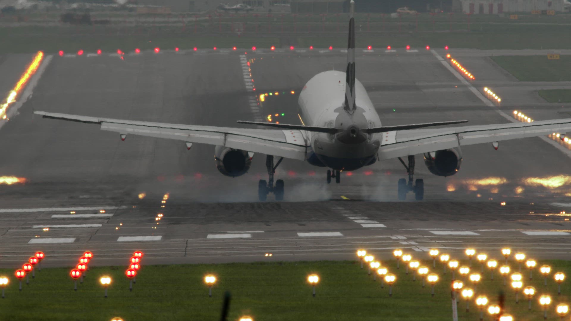 Airplane landing at the airport - slow motion