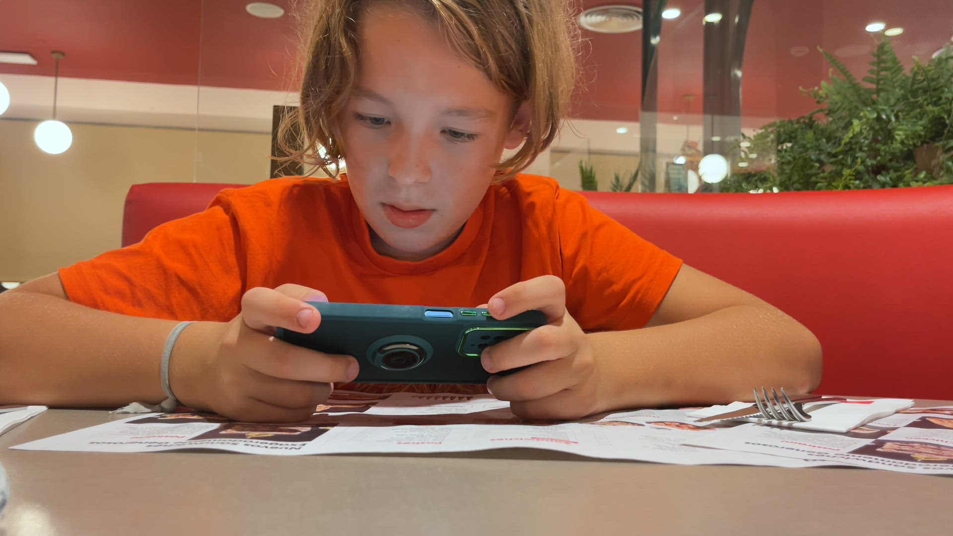 Teenager with a gadget