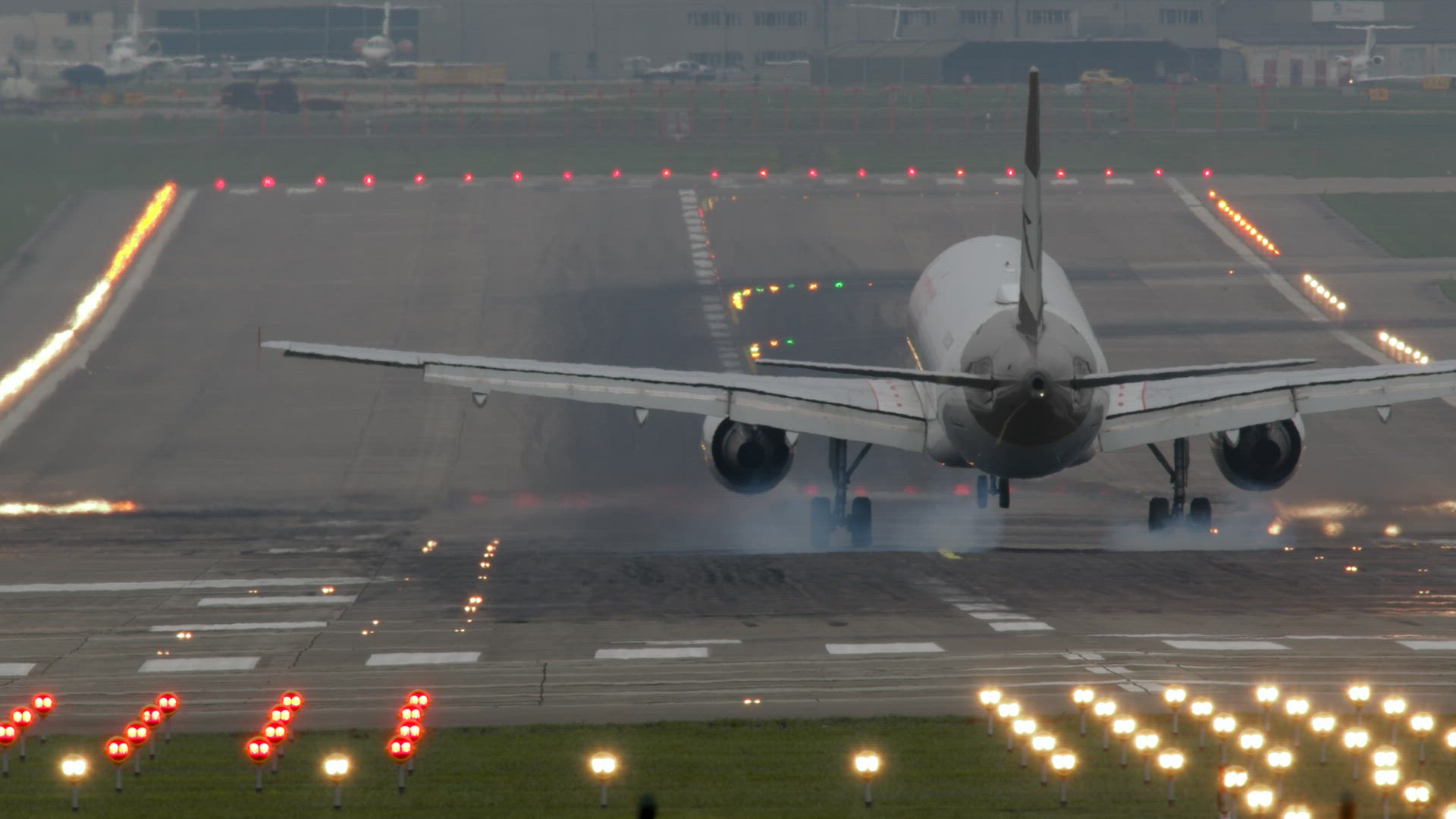 Slow motion - airplane landing at the airport
