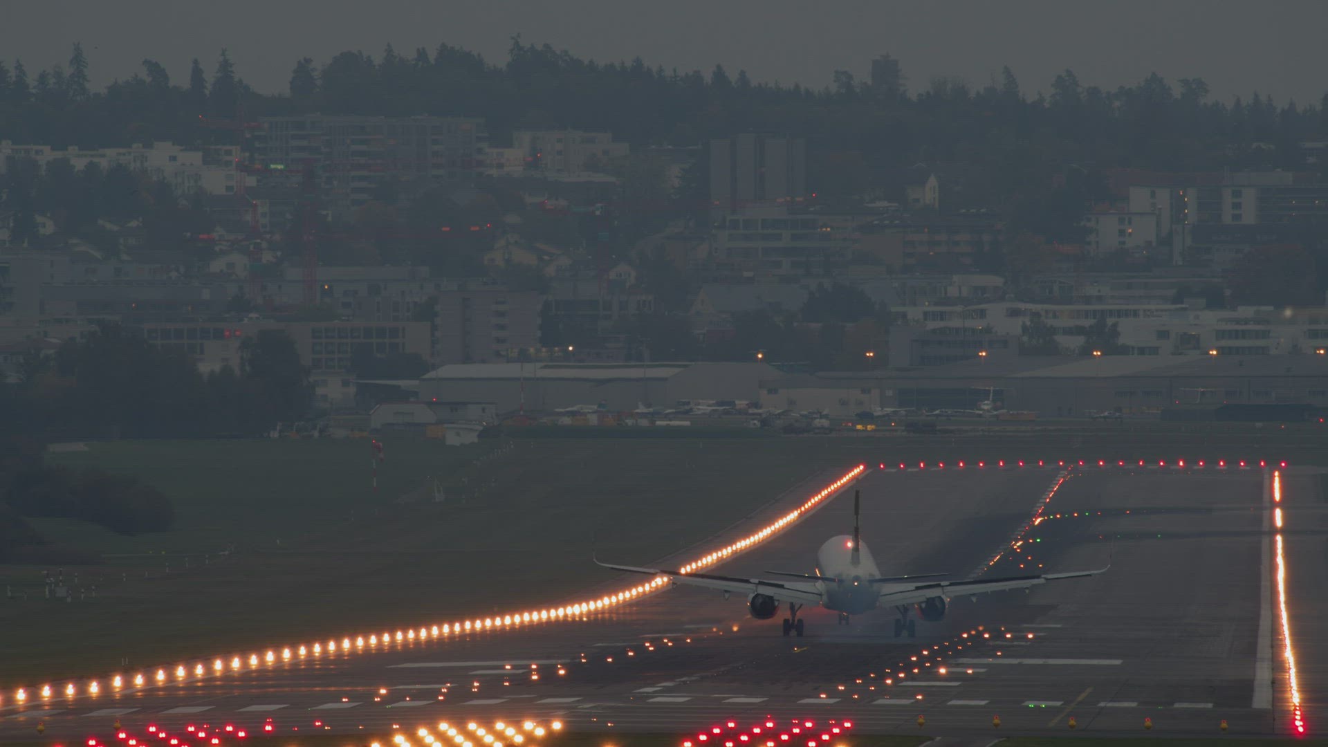 Airplane arriving during twilight