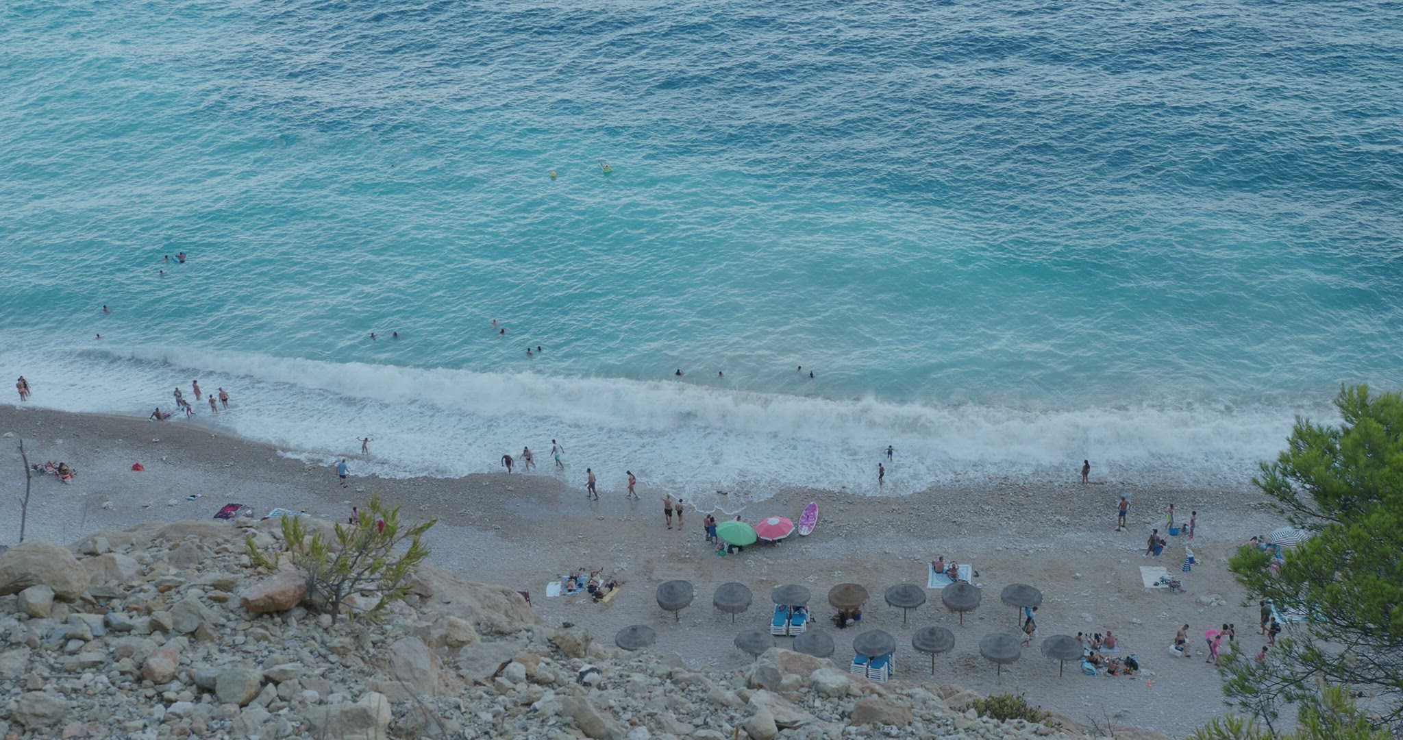 Top view - people resting at the sea coast