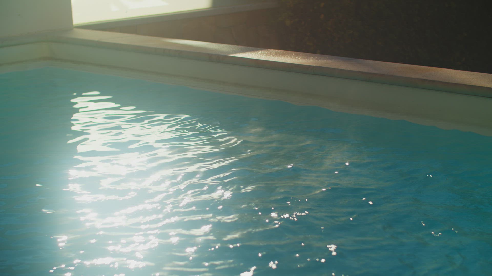 Serene Sun and Steam by the Pool