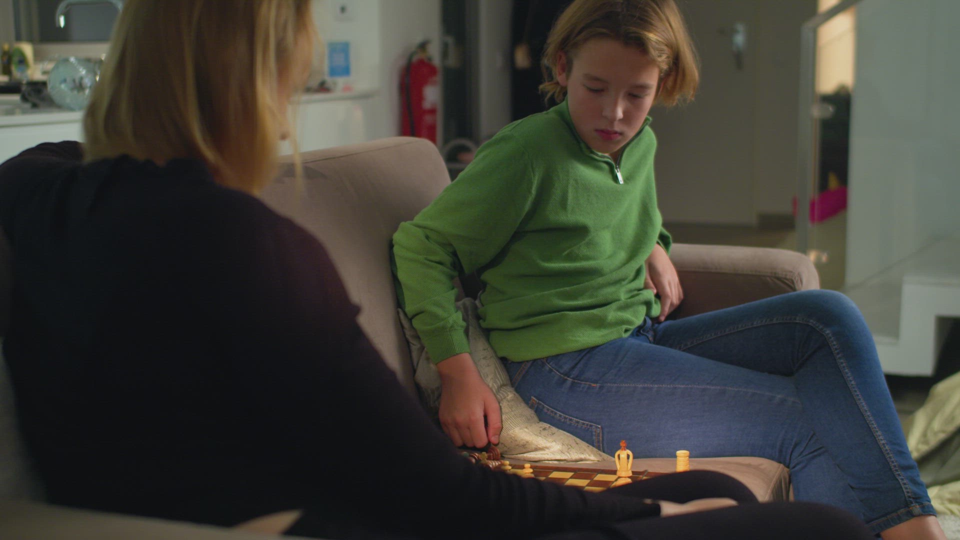 Playing chess with mom at home 3