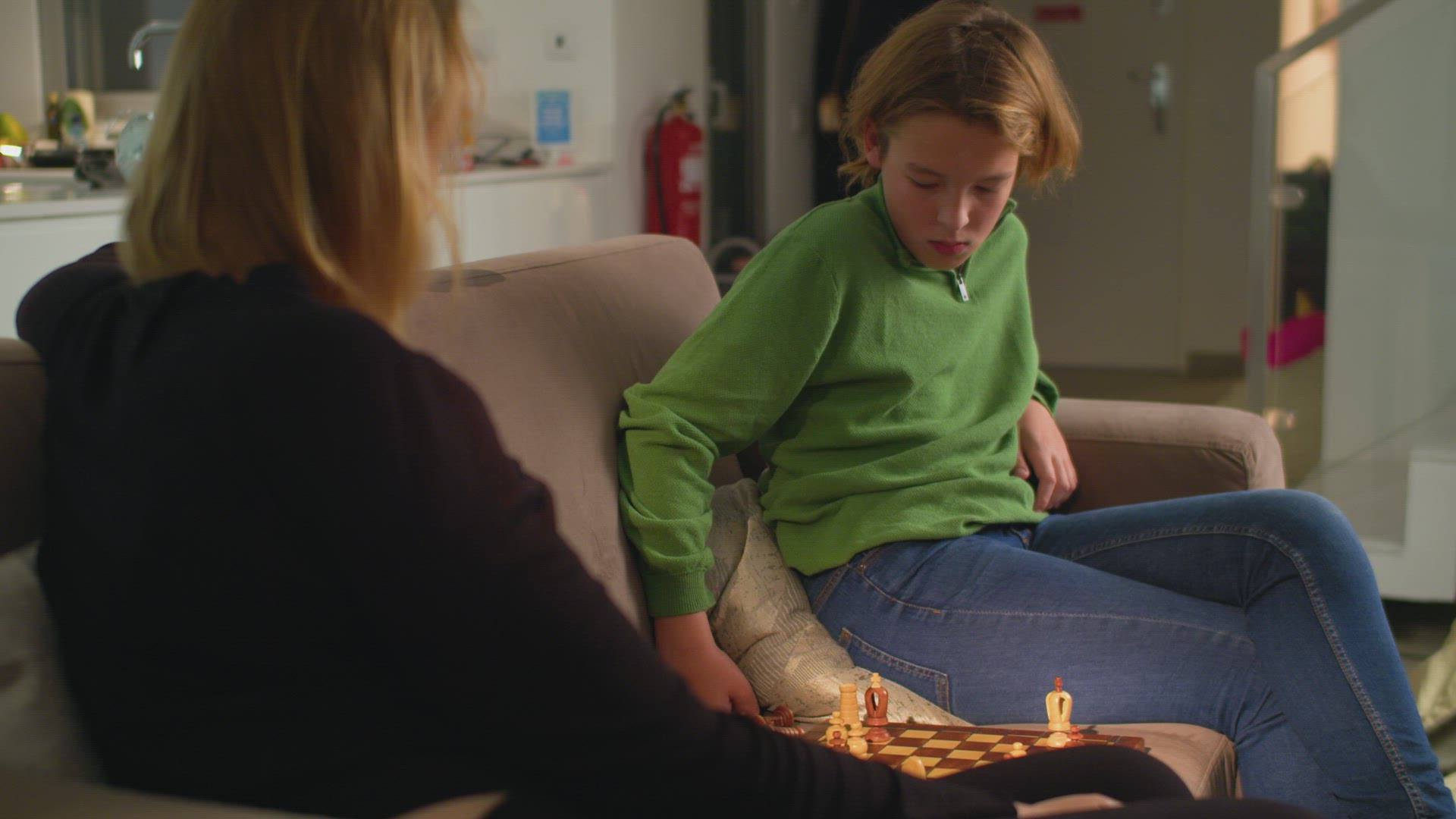 Playing chess with mom at home 4