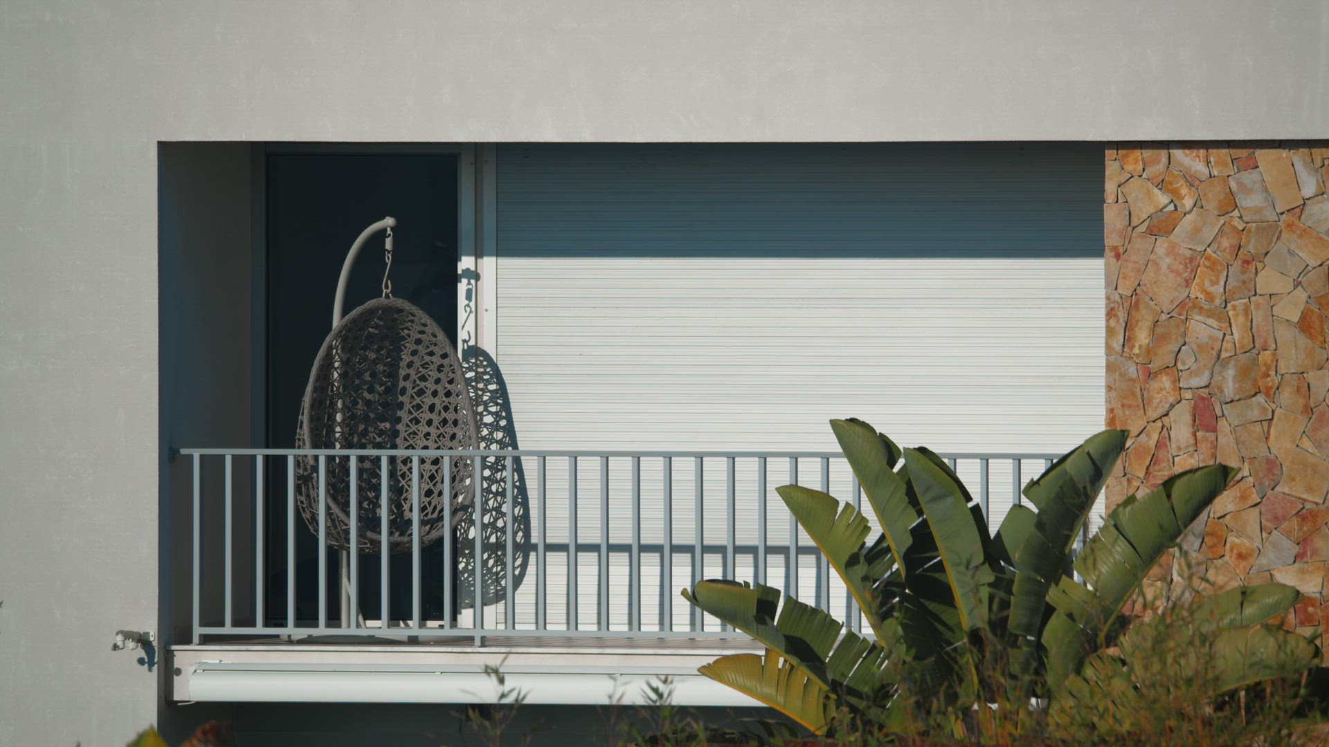 Sunny Balcony with Swing Chair in Portugal