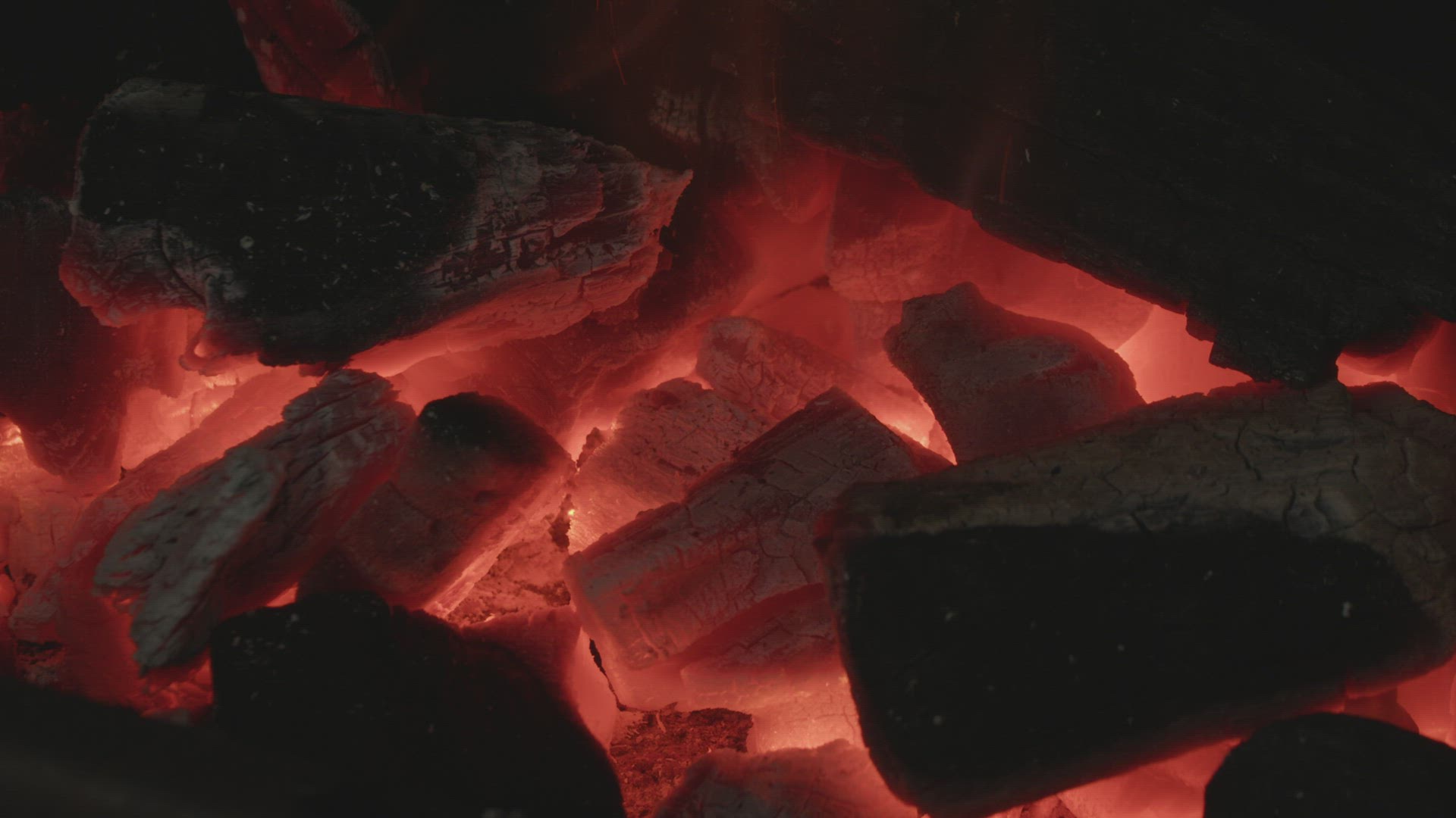 Charcoal burns and flames