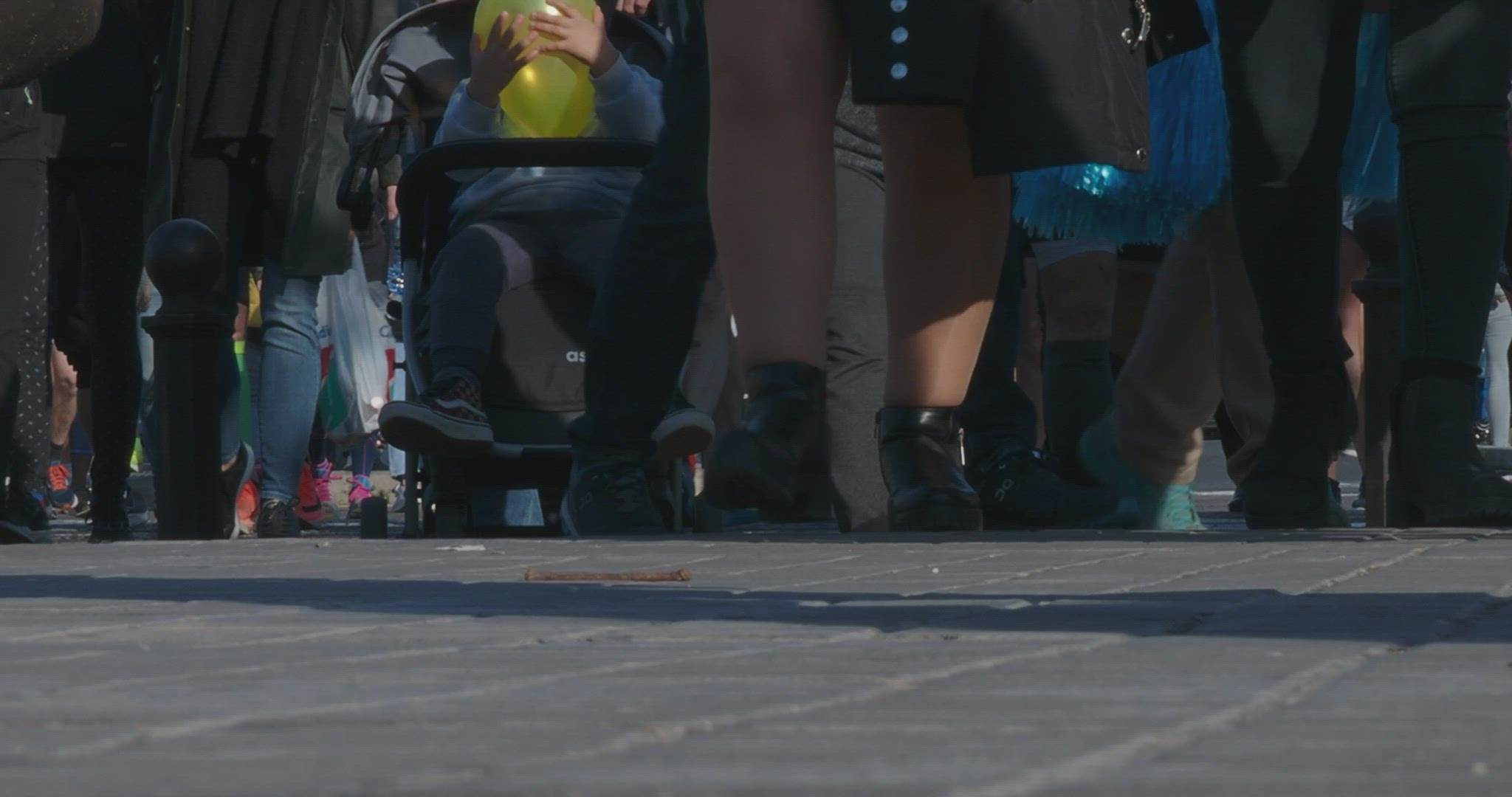 Crossing feet in urban scene