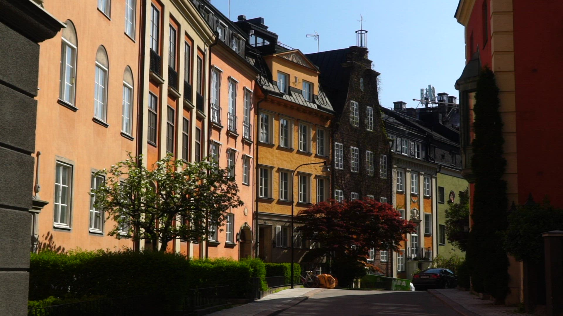 slow motion shot - pov walking on fashionable street in stockholm - facades of old beautiful houses