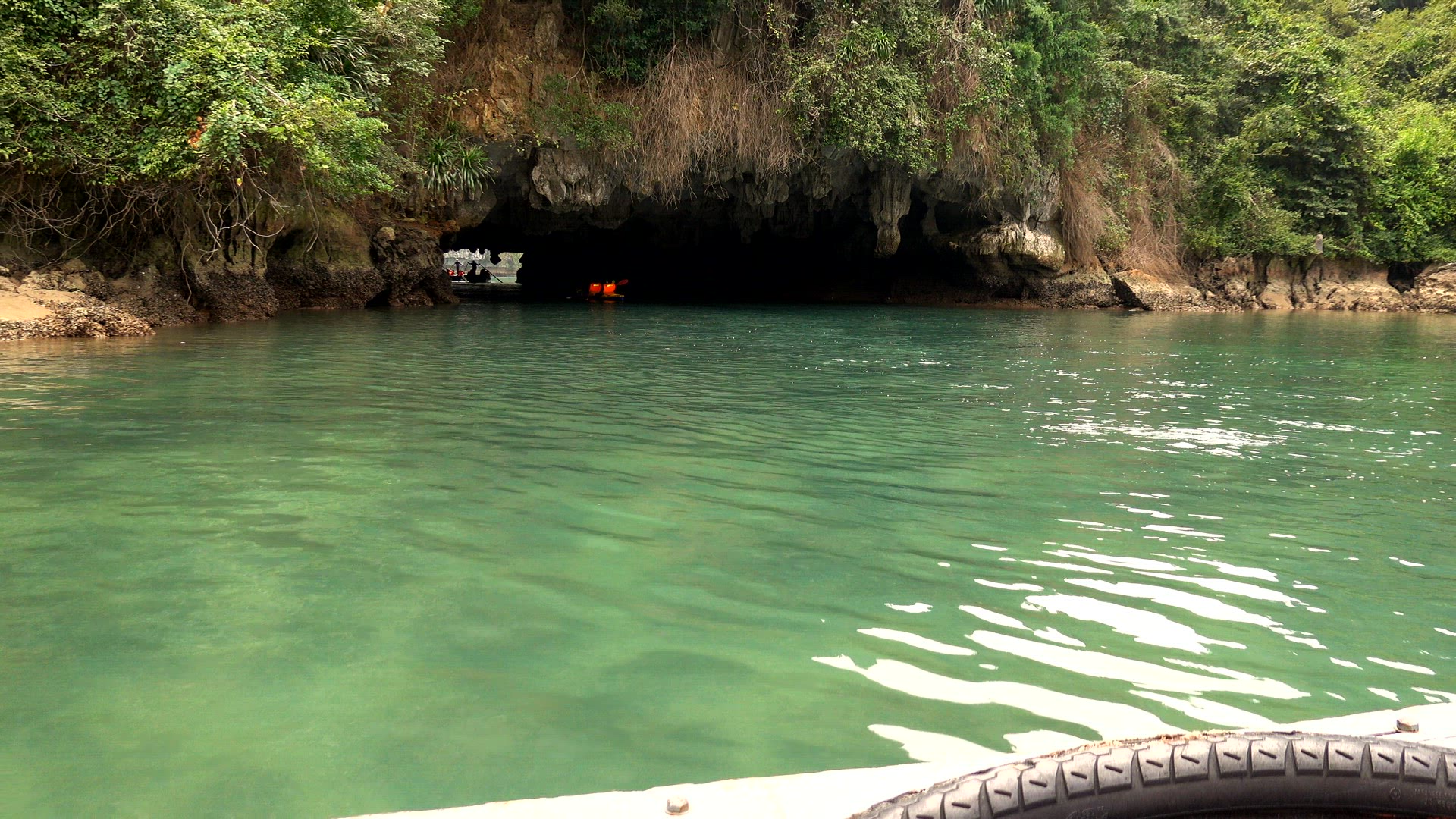 Kayakers paddling amongst the islands of Ha Long Bay