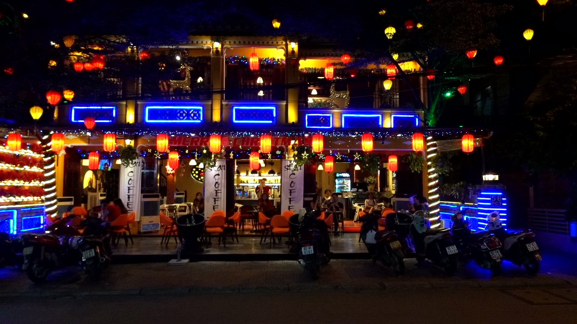 Traffic in front of a restaurant in Vietnam
