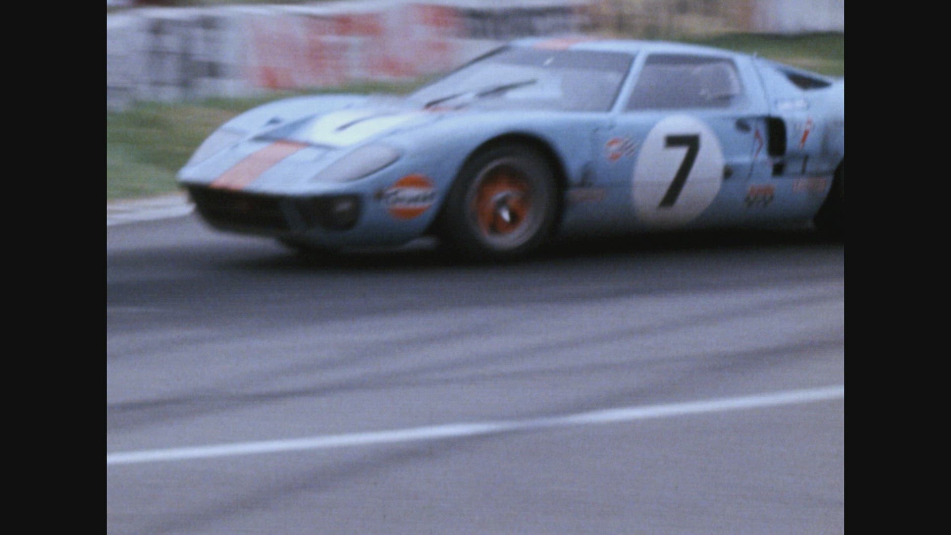 Cars no.7, 12, 17, 22, 44 and 68 racing in the morning (Le Mans 24 Hour Race 1969)