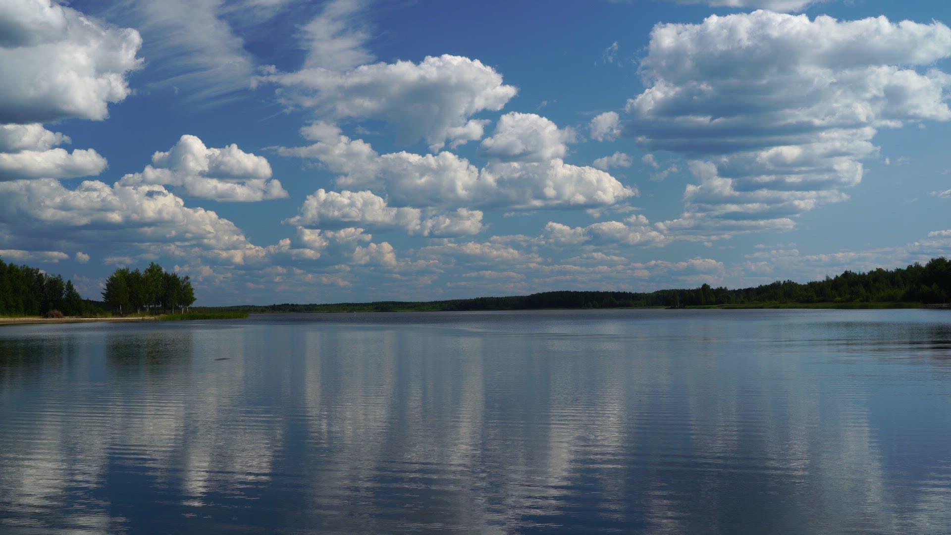view water and sky with white puffy clouds in Ostrobothnia Finalnd - Baltic Sea