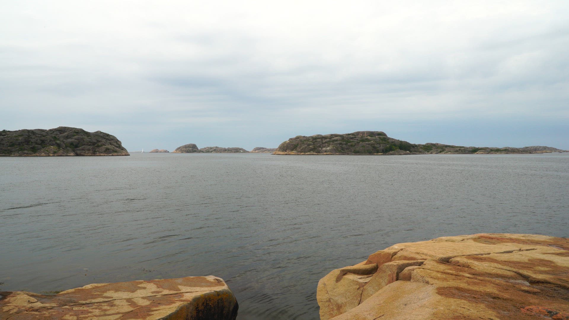 coastal landscape in Bohuslän - cliffs and sea - cloudy skies