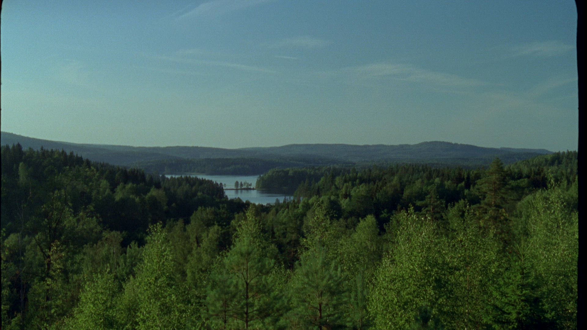 view over landscape with forests and lake in Värmland - overview from viewpoint