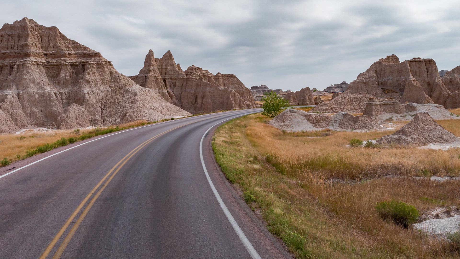 POV from car moving along road at Badlands National Park