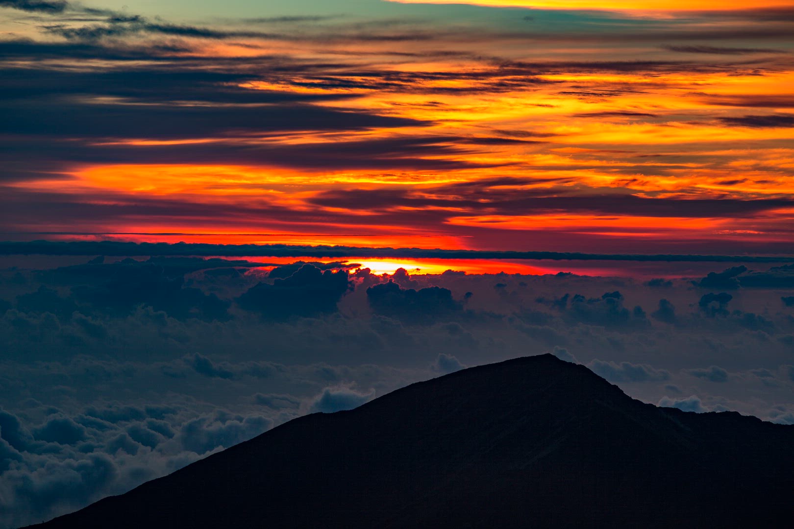 Sunrise as seen from top of mountain at Haleakala National Park