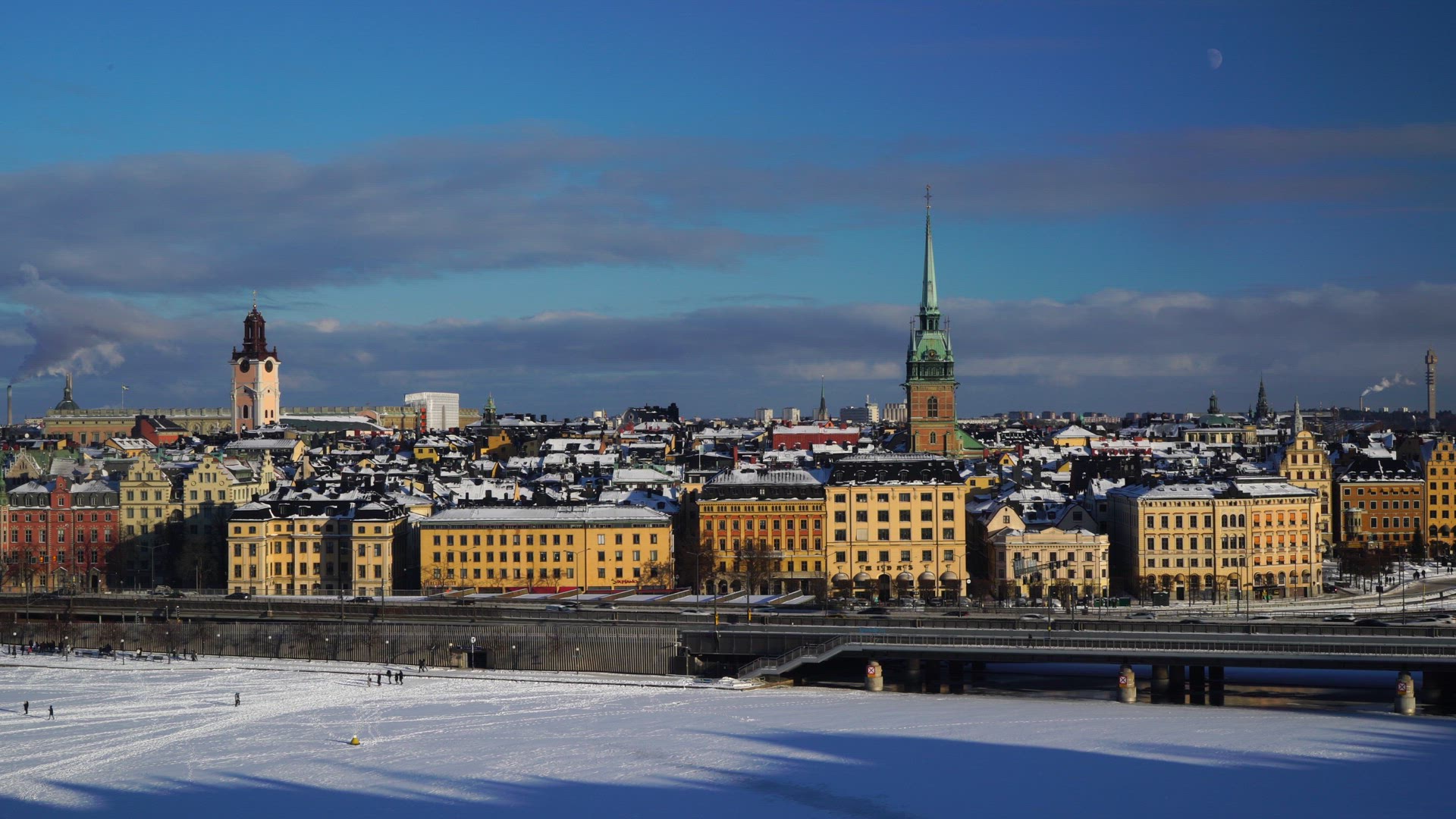 view over ice covered riddarfjärden and old town in stockholm