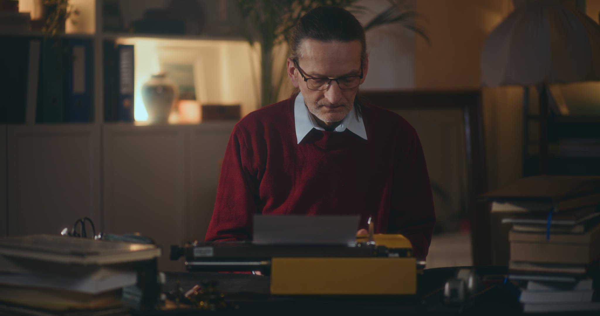 Senior Man At Office Working Late Night