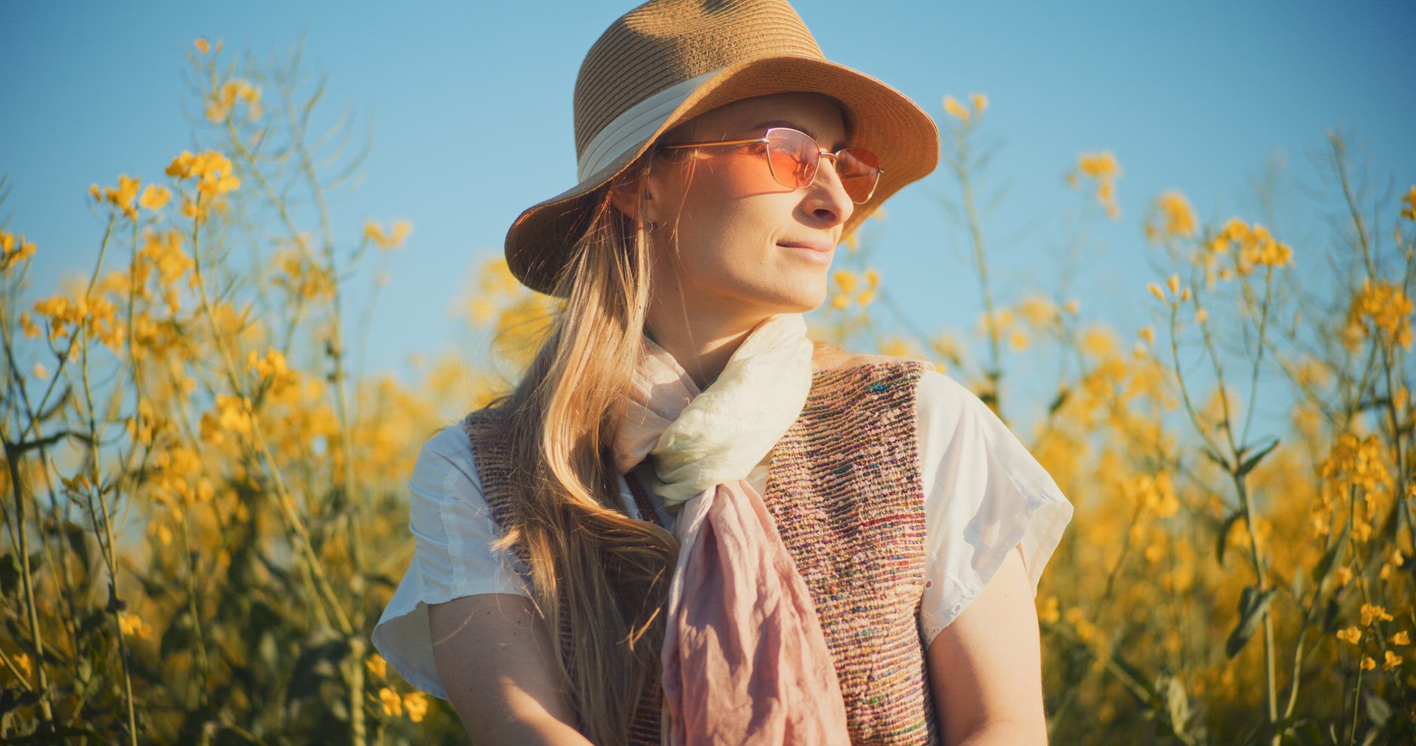 Smiling Woman Walking Rapeseed Field Portrait