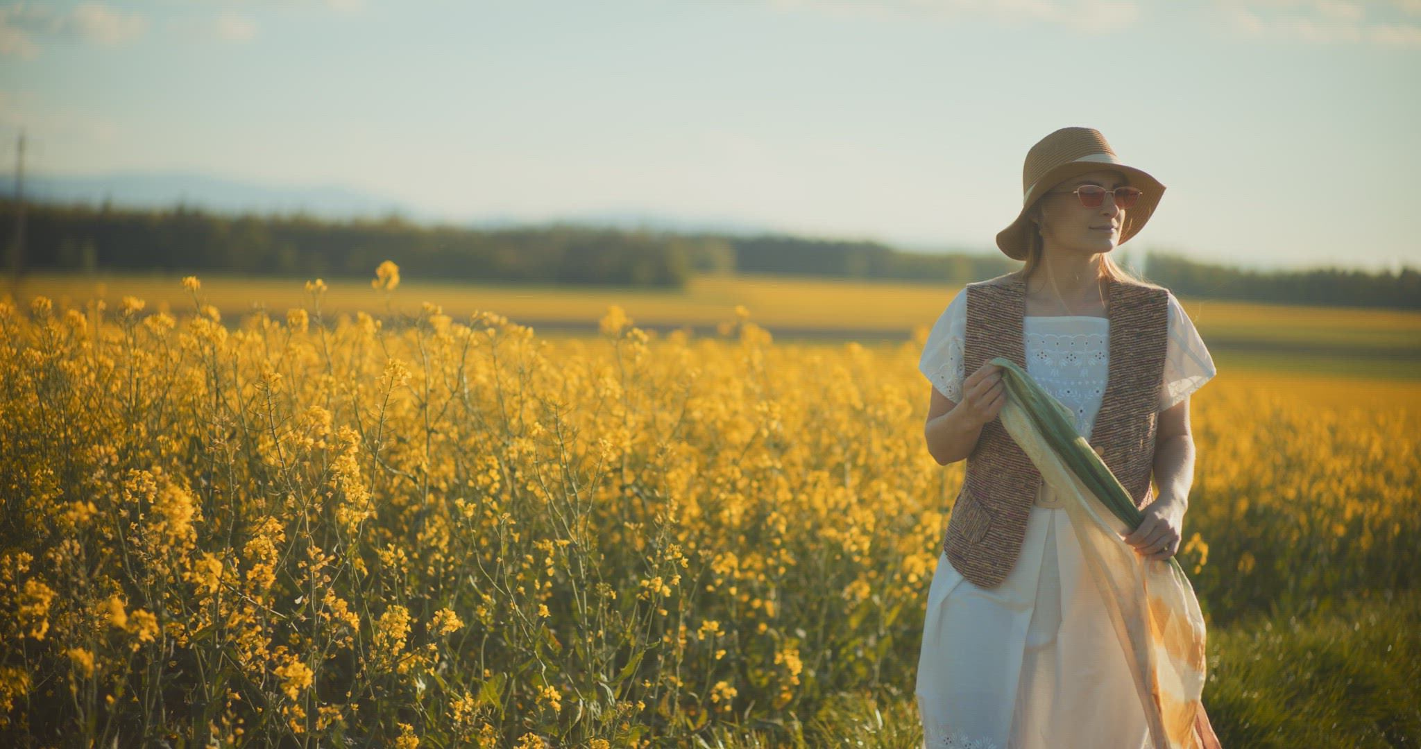 Smiling Woman Walking Rapeseed Field Portrait