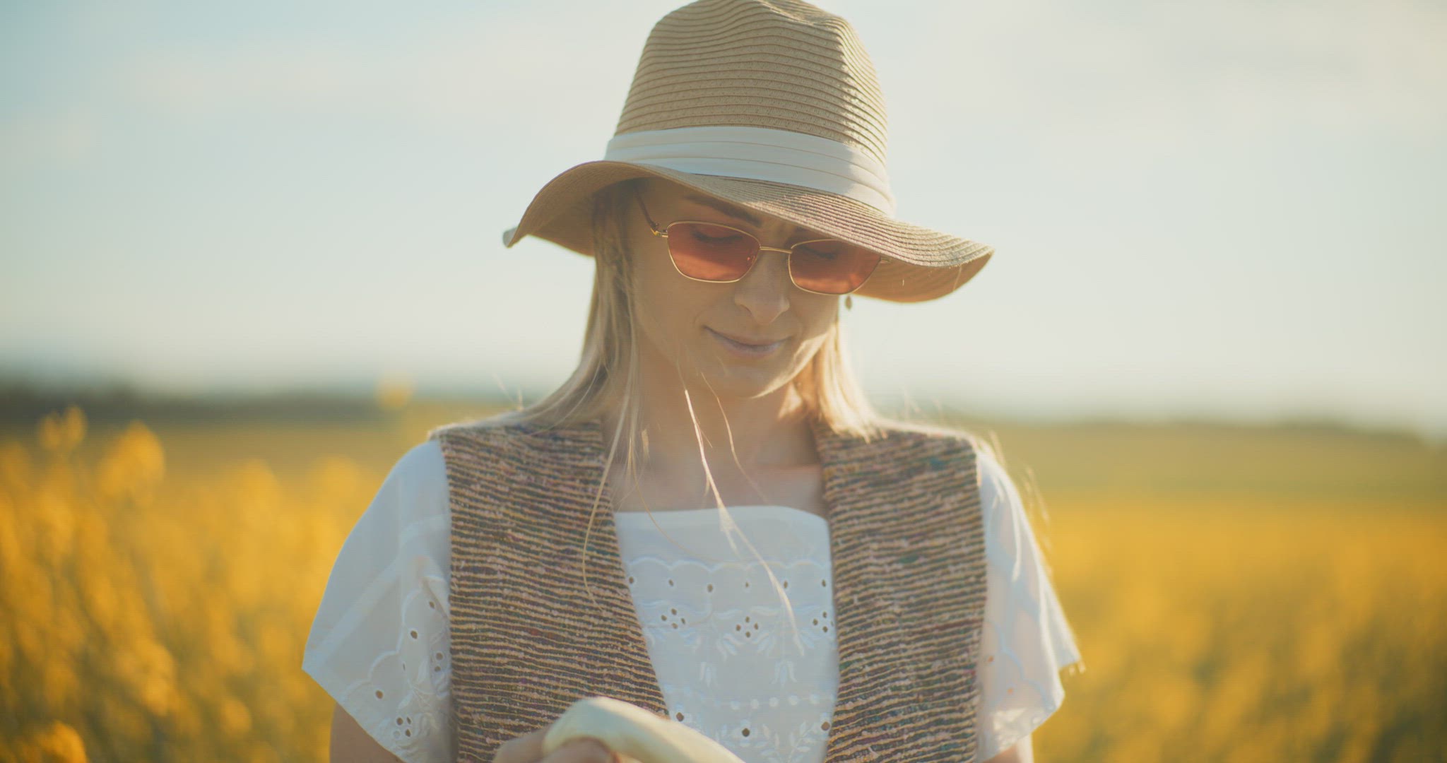 Smiling Woman Walking Rapeseed Field Portrait