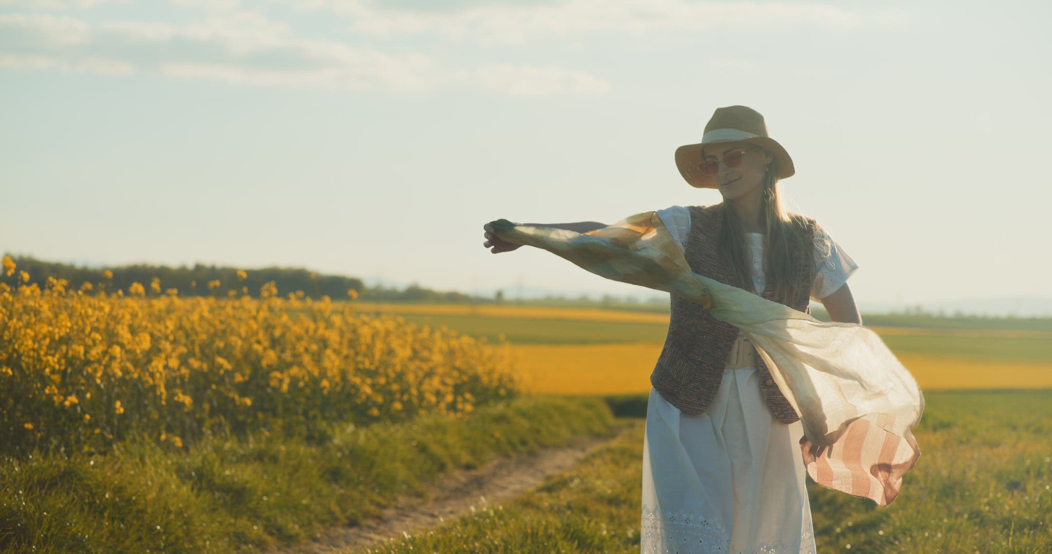 Smiling Woman Walking Rapeseed Field Portrait