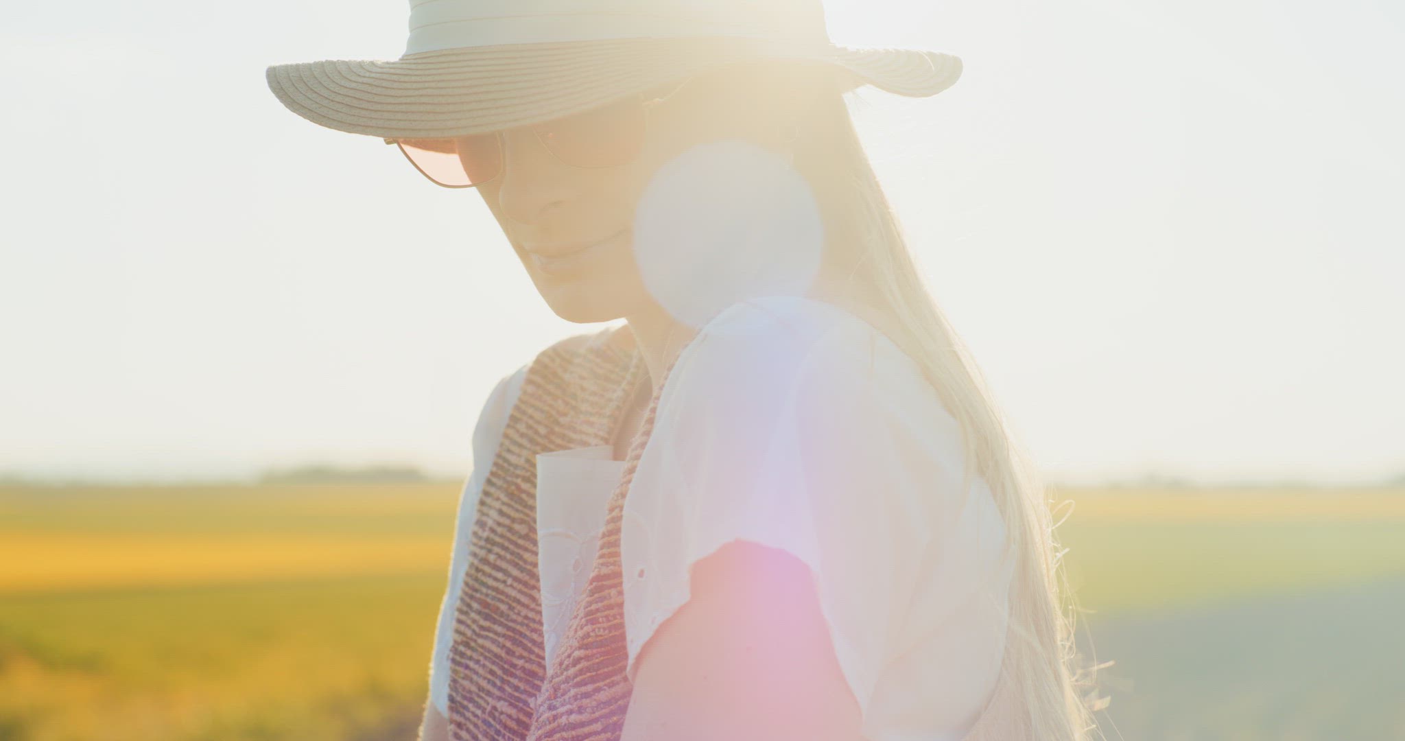 Smiling Woman Walking Rapeseed Field Portrait