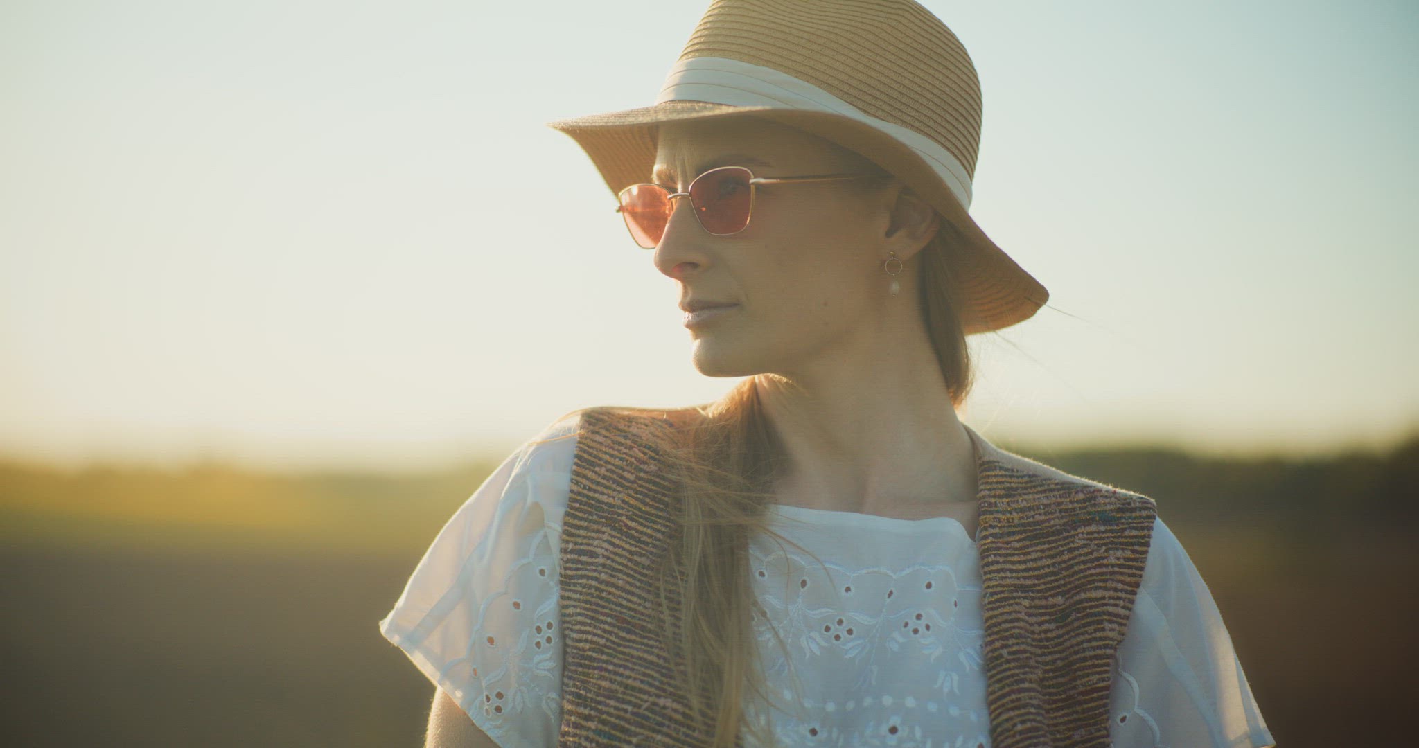 Smiling Woman Walking Rapeseed Field Portrait