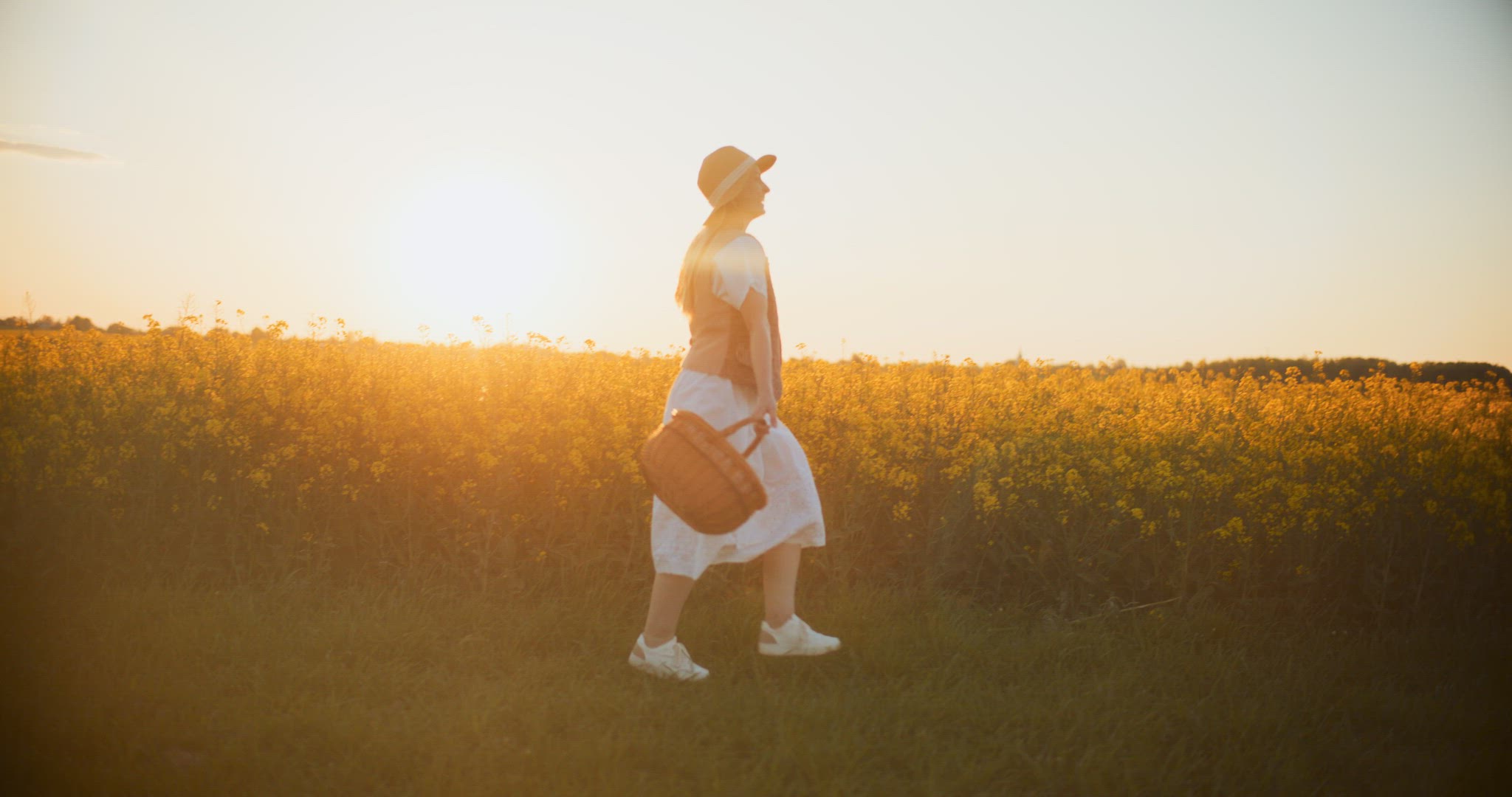 Smiling Woman Walking Rapeseed Field Portrait