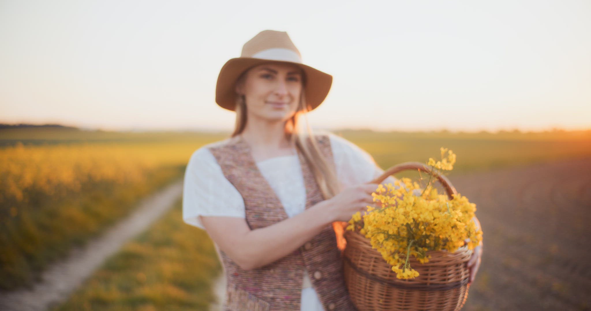 Smiling Woman Walking Rapeseed Field Portrait