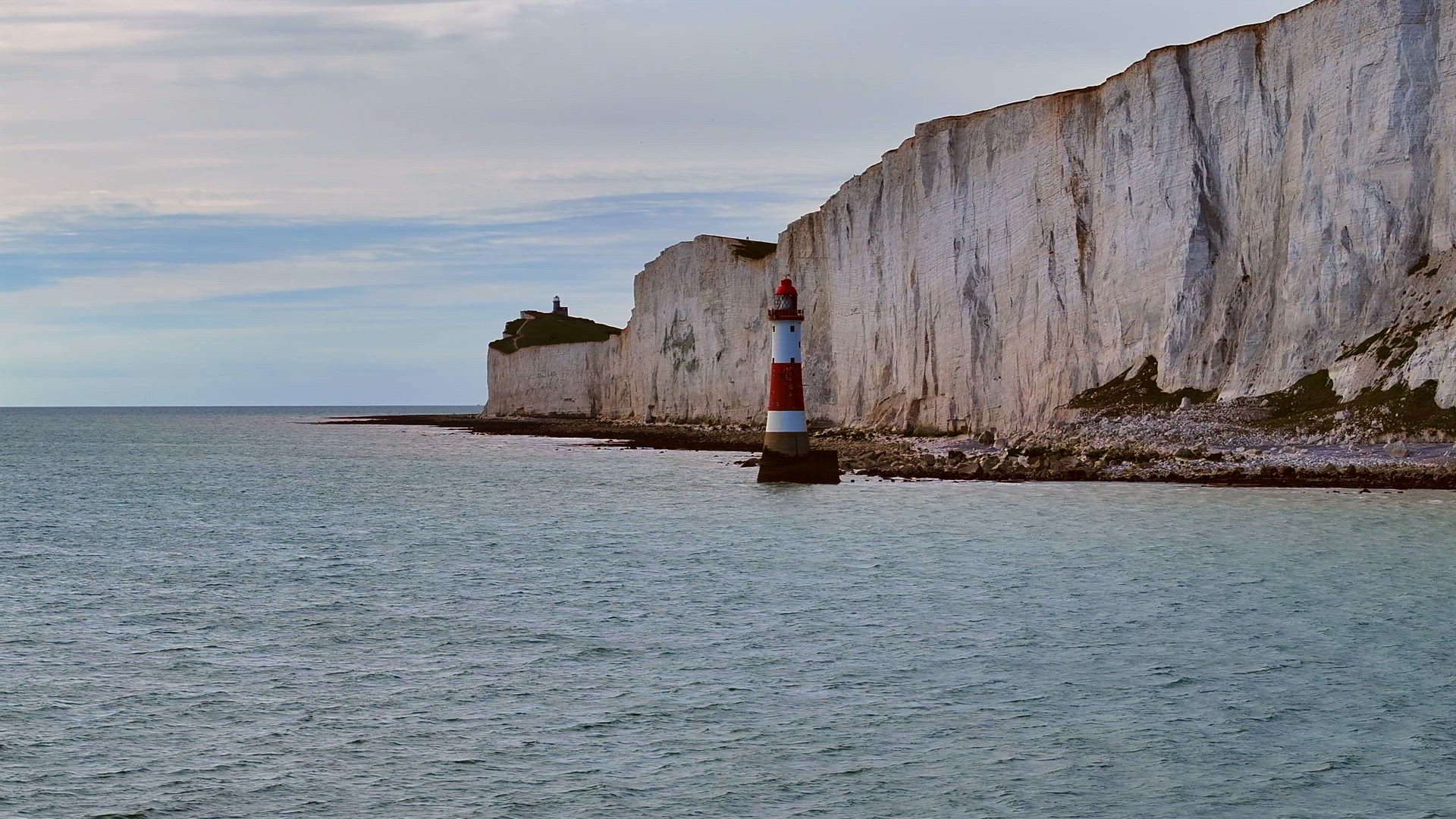 English Coastline Featuring a Beautiful Lighthouse Aerial View