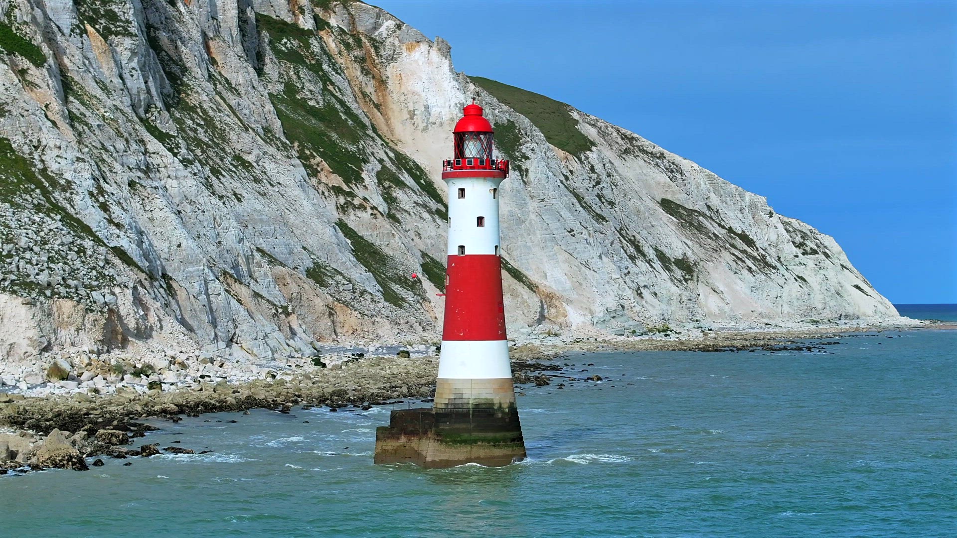 English Coastline Featuring a Beautiful Lighthouse Aerial View