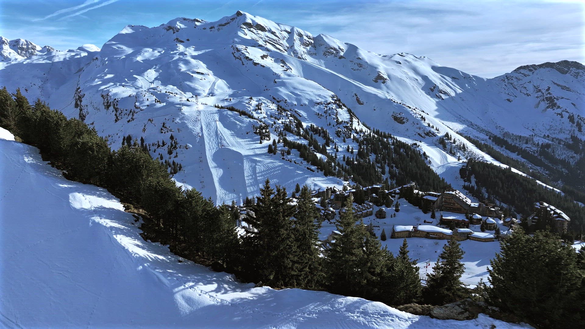 Skiers on a Ski Slope in the French Alps