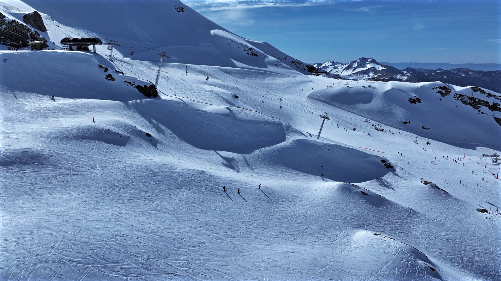 Skiers on a Ski Slope in the French Alps