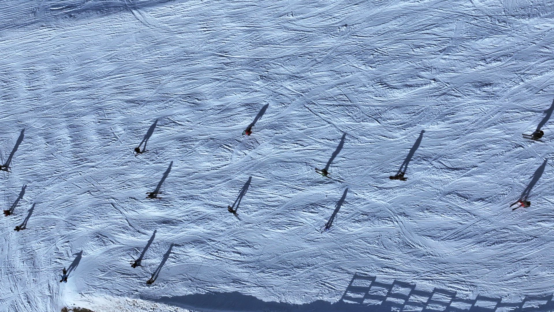 Skiing and Snowboarding on a Piste in the French Alps Aerial View
