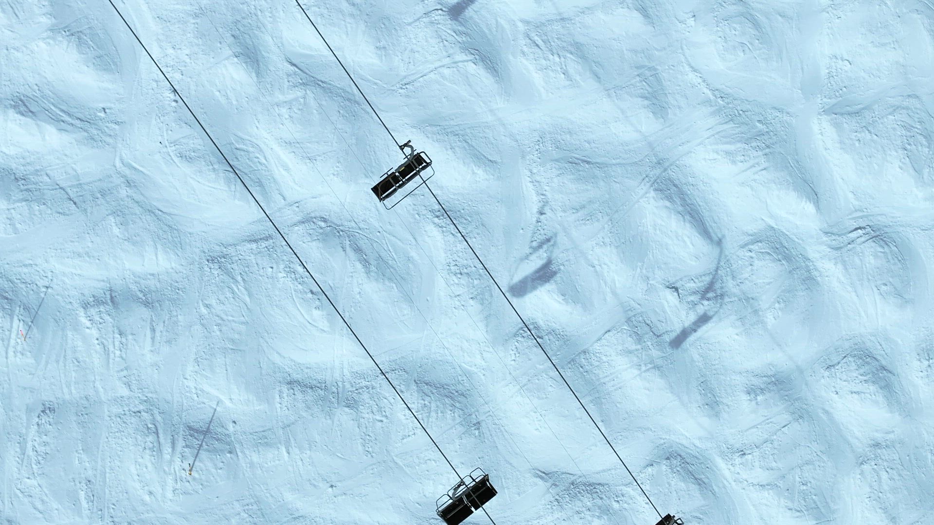 Bird's Eye Aerial View of a Ski Chairlift in a Resort