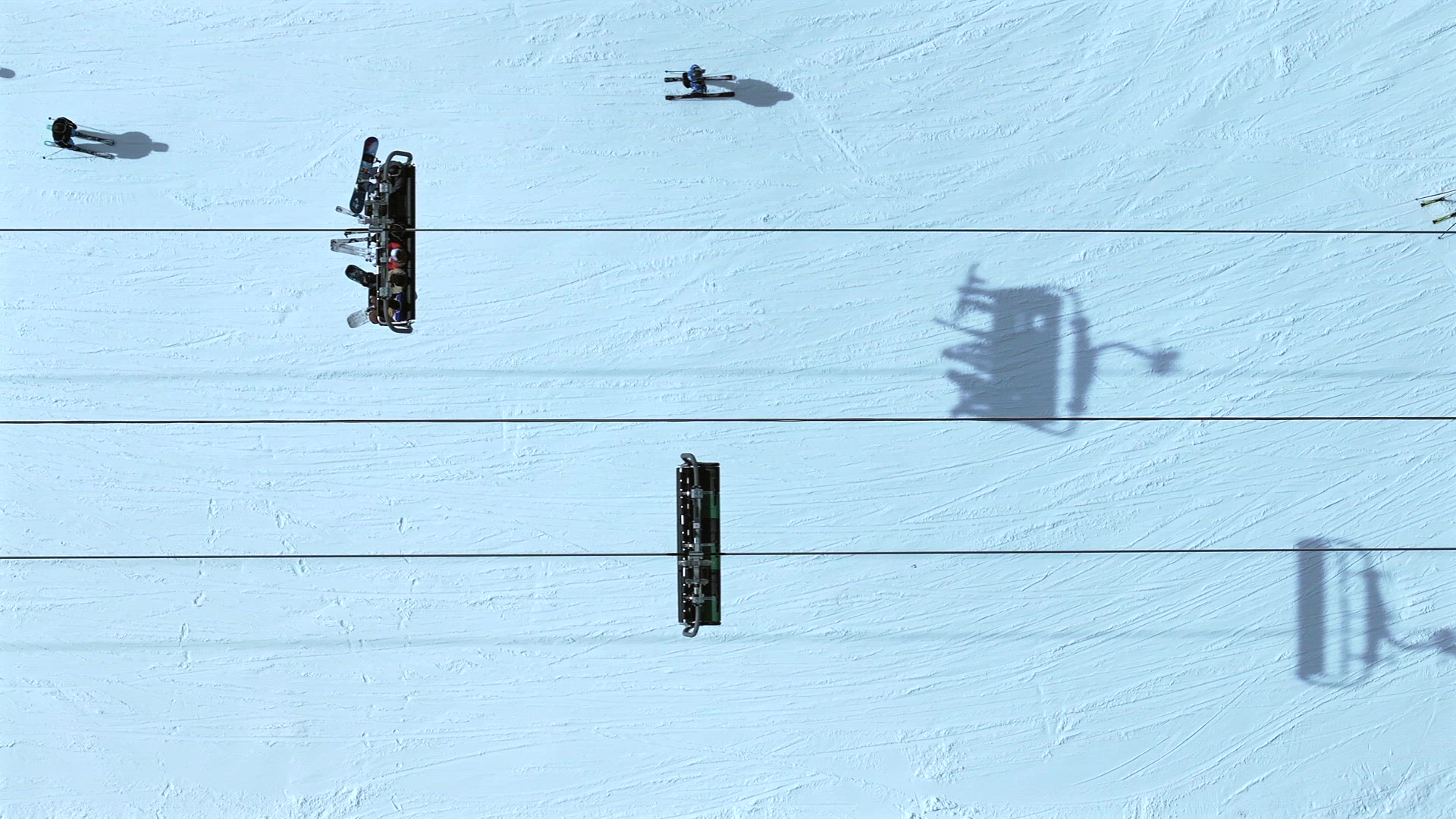 Abstract Bird's Eye Aerial View of a Ski Chairlift in a Resort