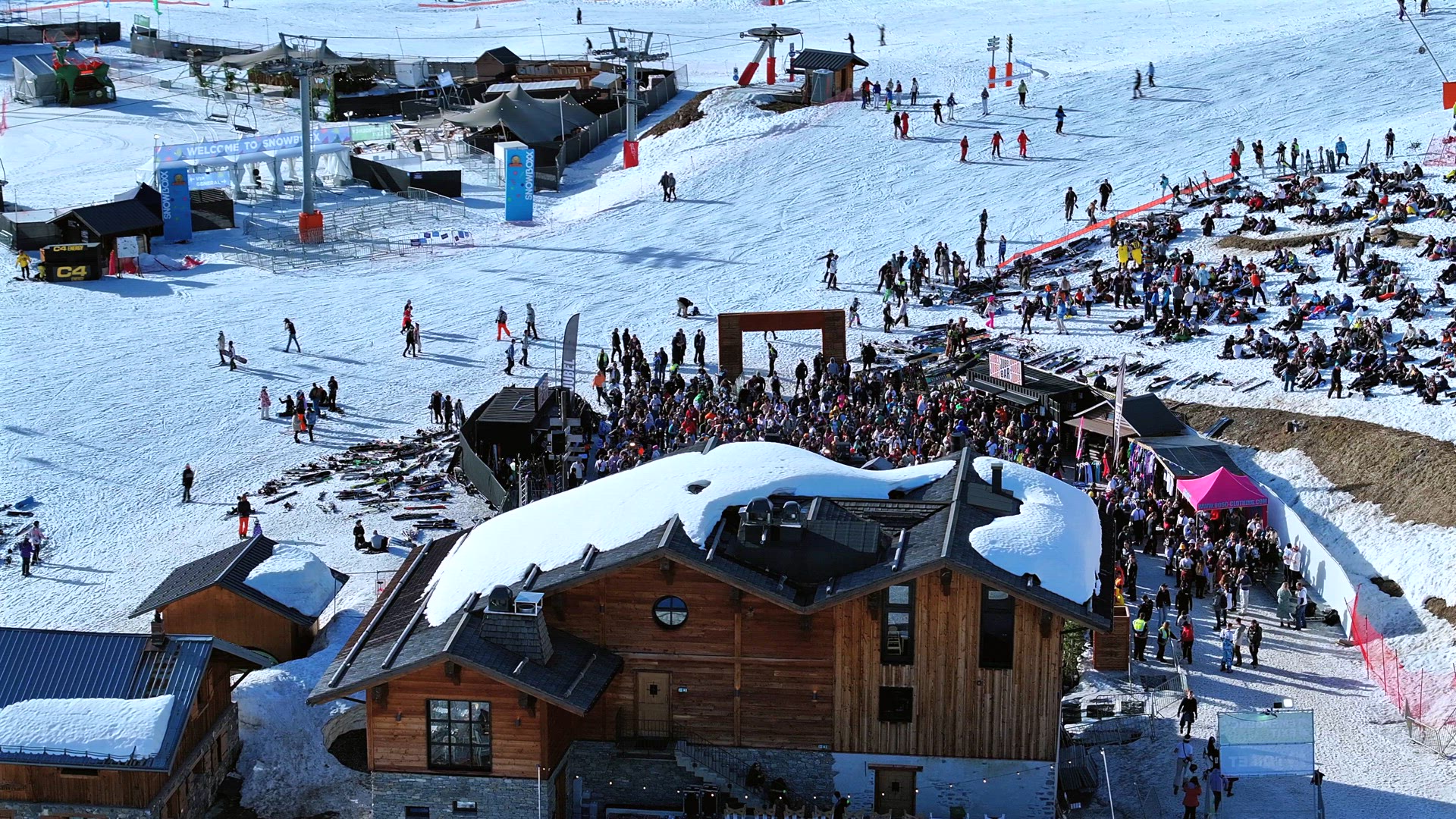 Crowds of People Partying at a Bar Enjoying Apres Ski