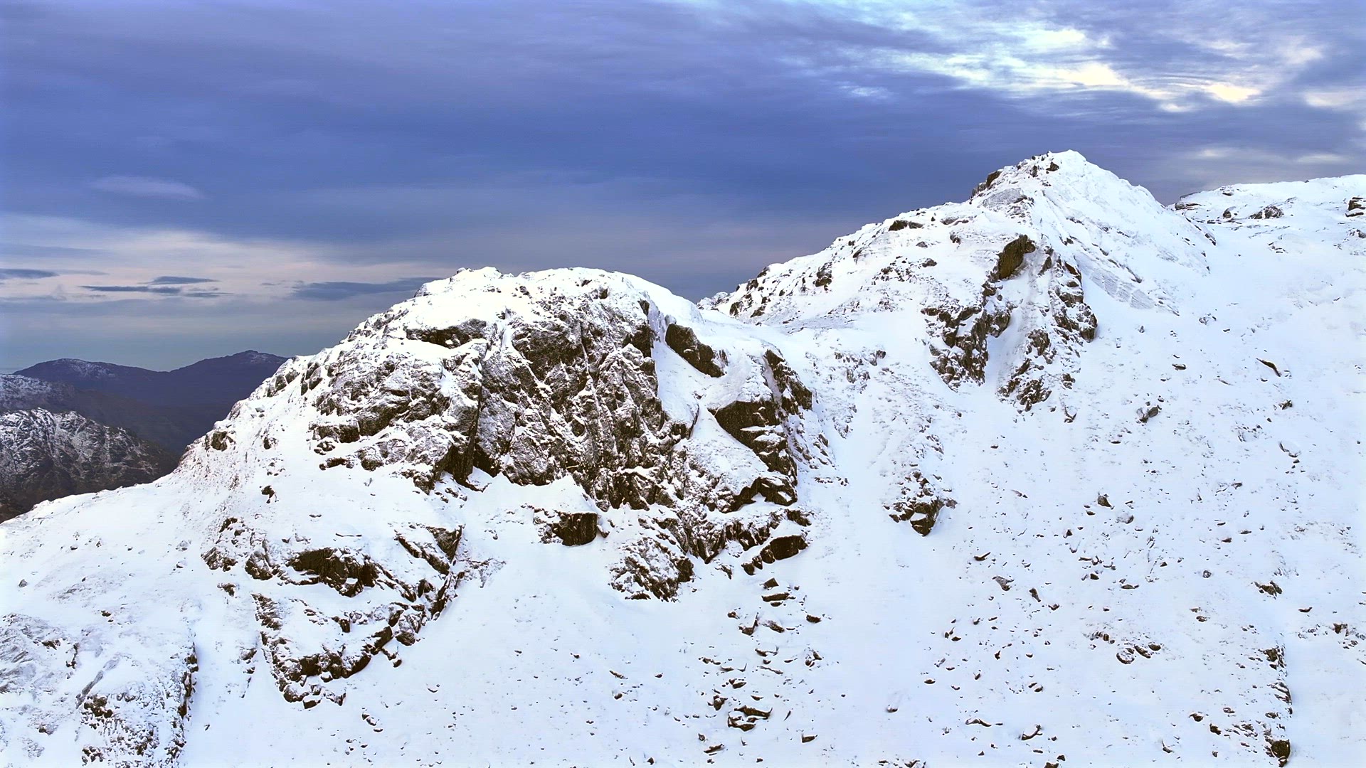 Scottish Highlands in the Winter the Rugged Mountains Covered in Snow